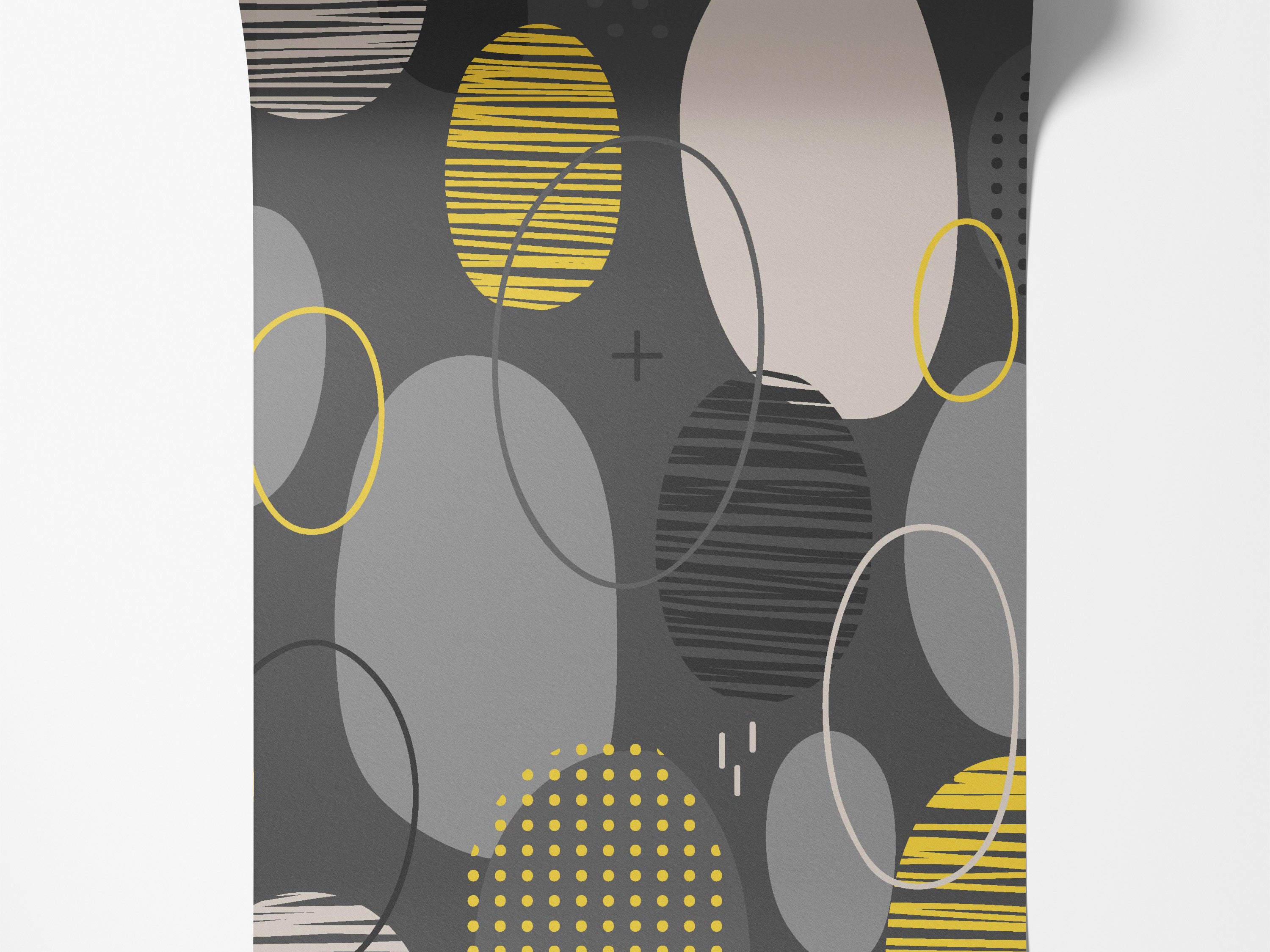Geometric wallpaper with overlapping ovals in yellow, gray, and beige, featuring striped and dotted patterns on a dark gray background.