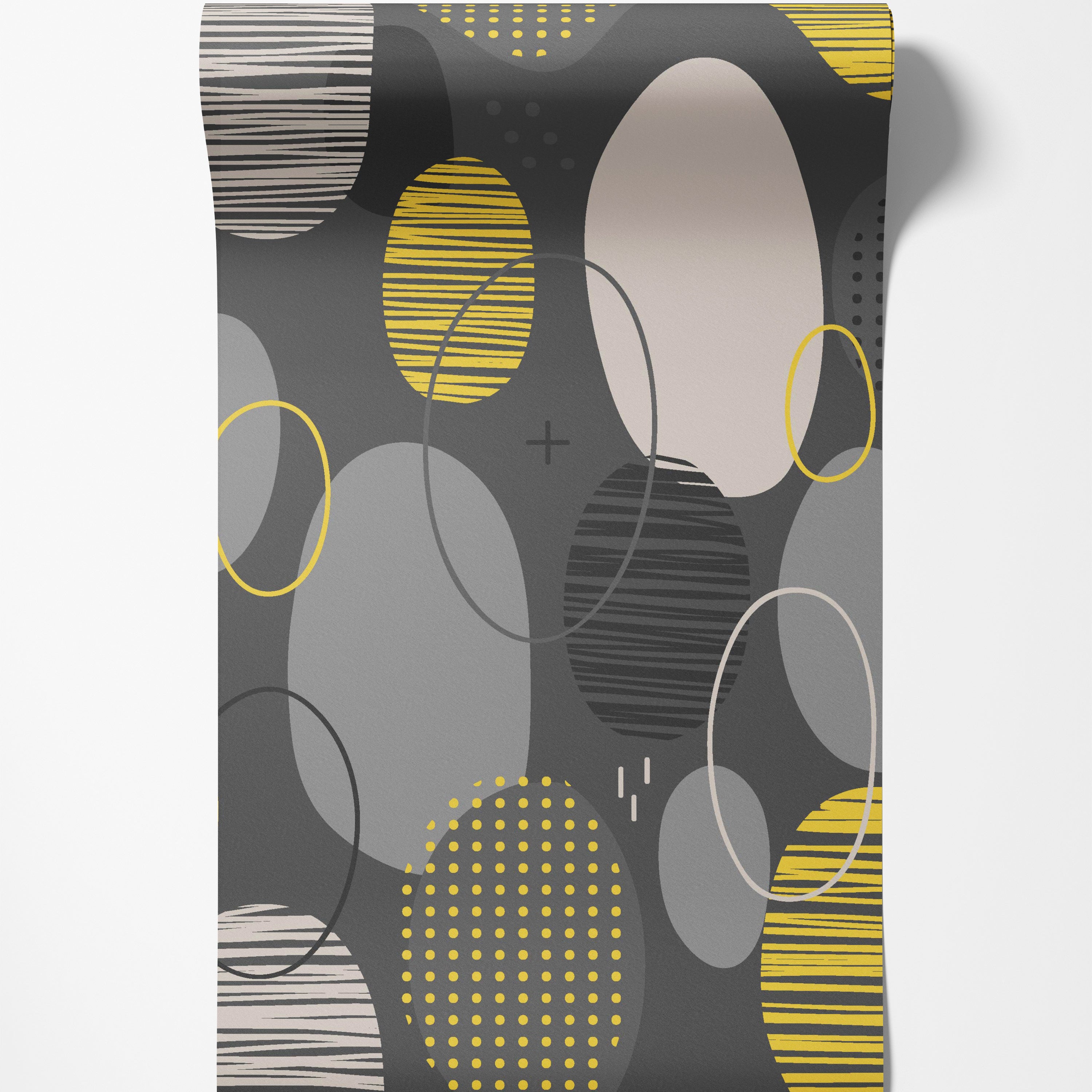 Geometric wallpaper with overlapping ovals in yellow, gray, and beige, featuring striped and dotted patterns on a dark gray background.