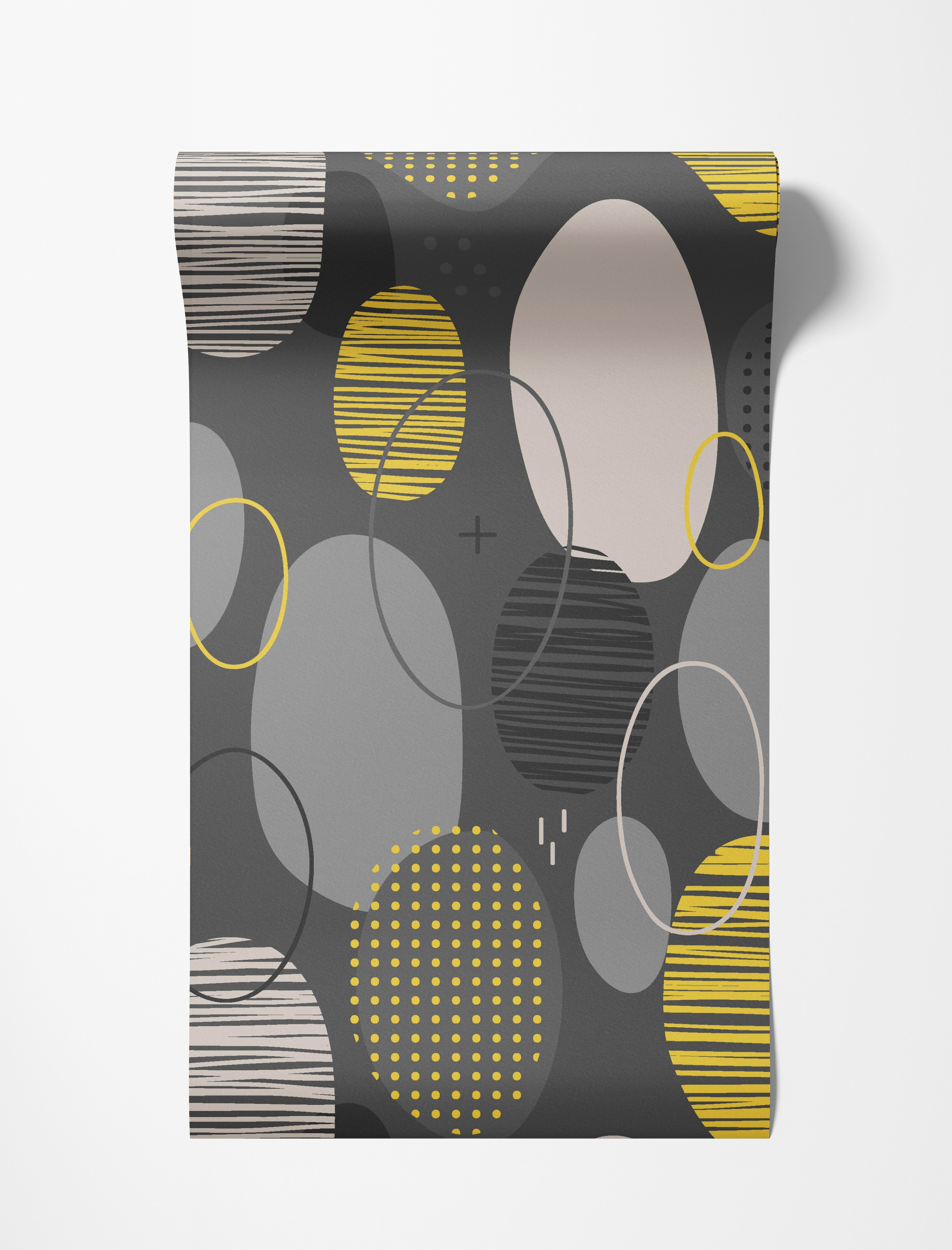 Geometric wallpaper with overlapping ovals in yellow, gray, and beige, featuring striped and dotted patterns on a dark gray background.