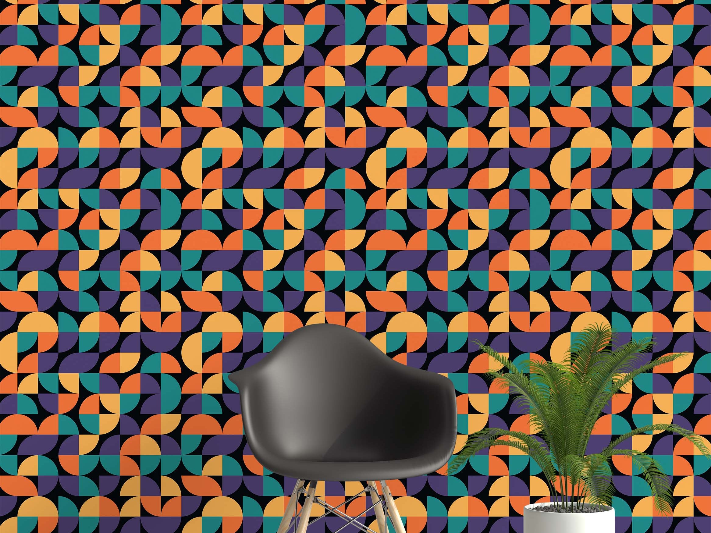 Wallpaper with a retro geometric pattern of quarter circles and ovals in orange, teal, and purple on a black background.