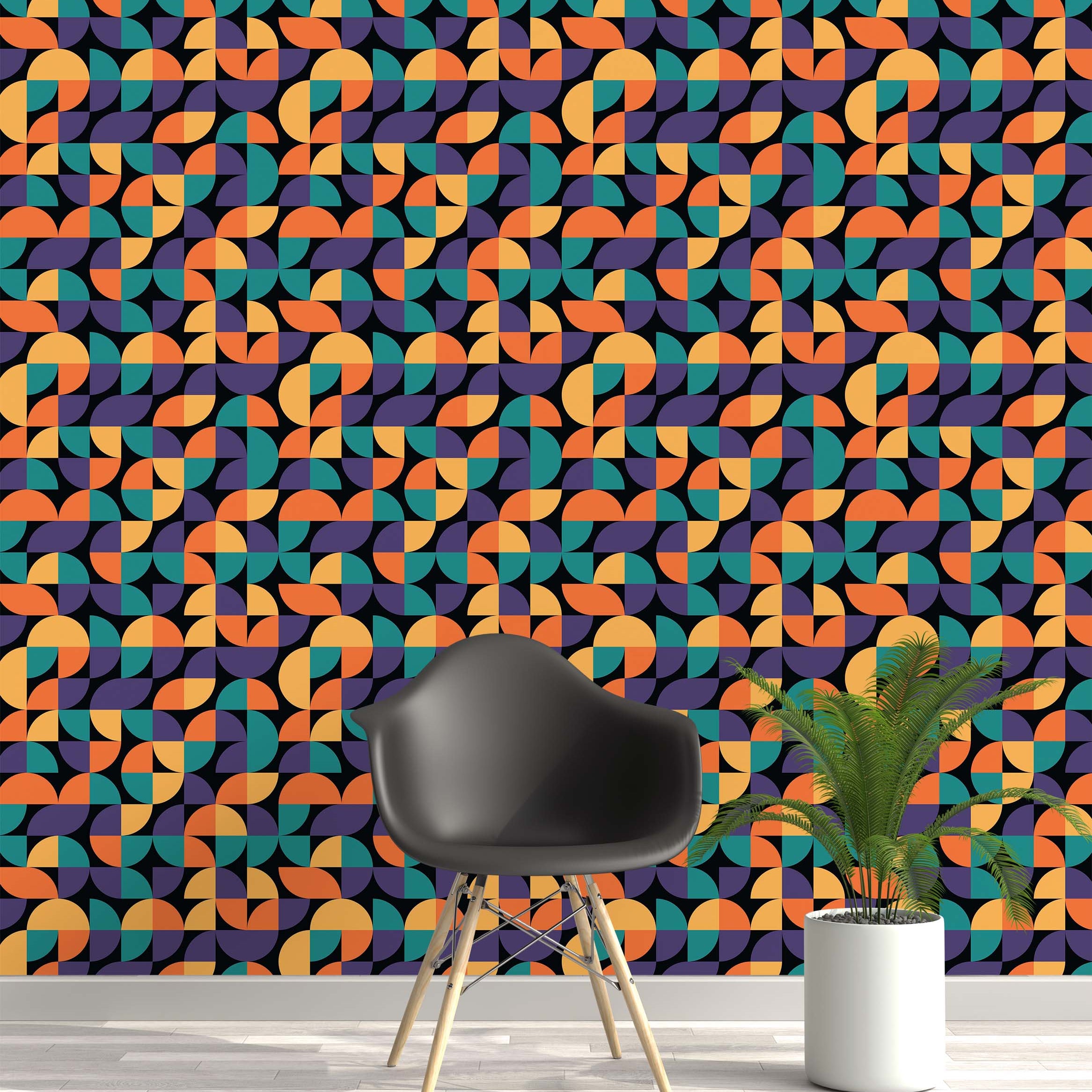 Wallpaper with a retro geometric pattern of quarter circles and ovals in orange, teal, and purple on a black background.
