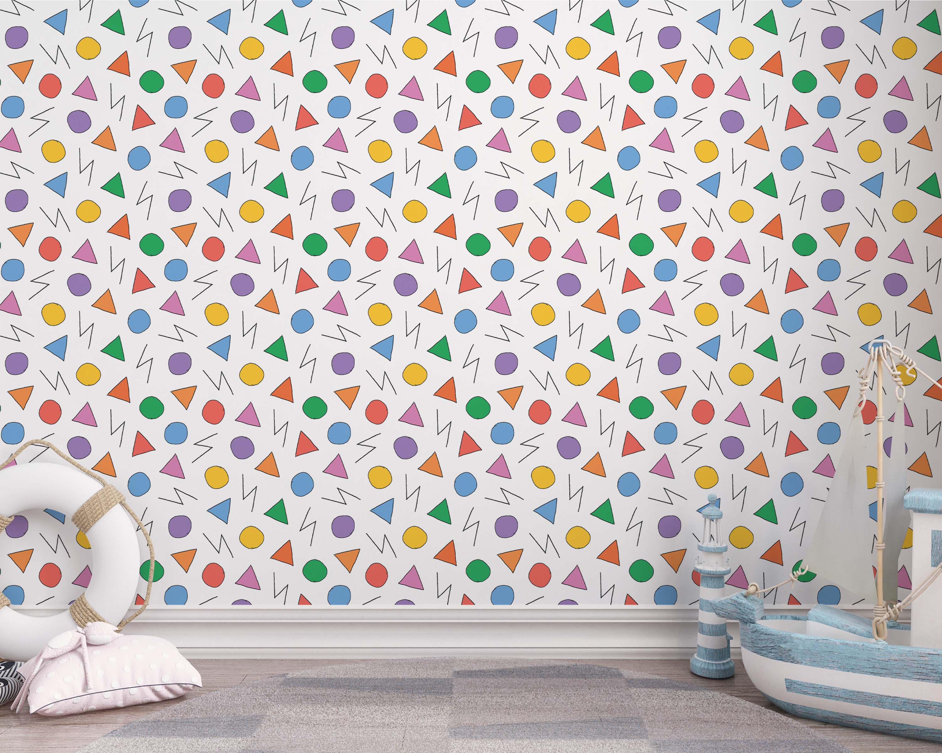 Playful wallpaper with hand-drawn colorful circles, triangles, and zig-zag lines on a white background.