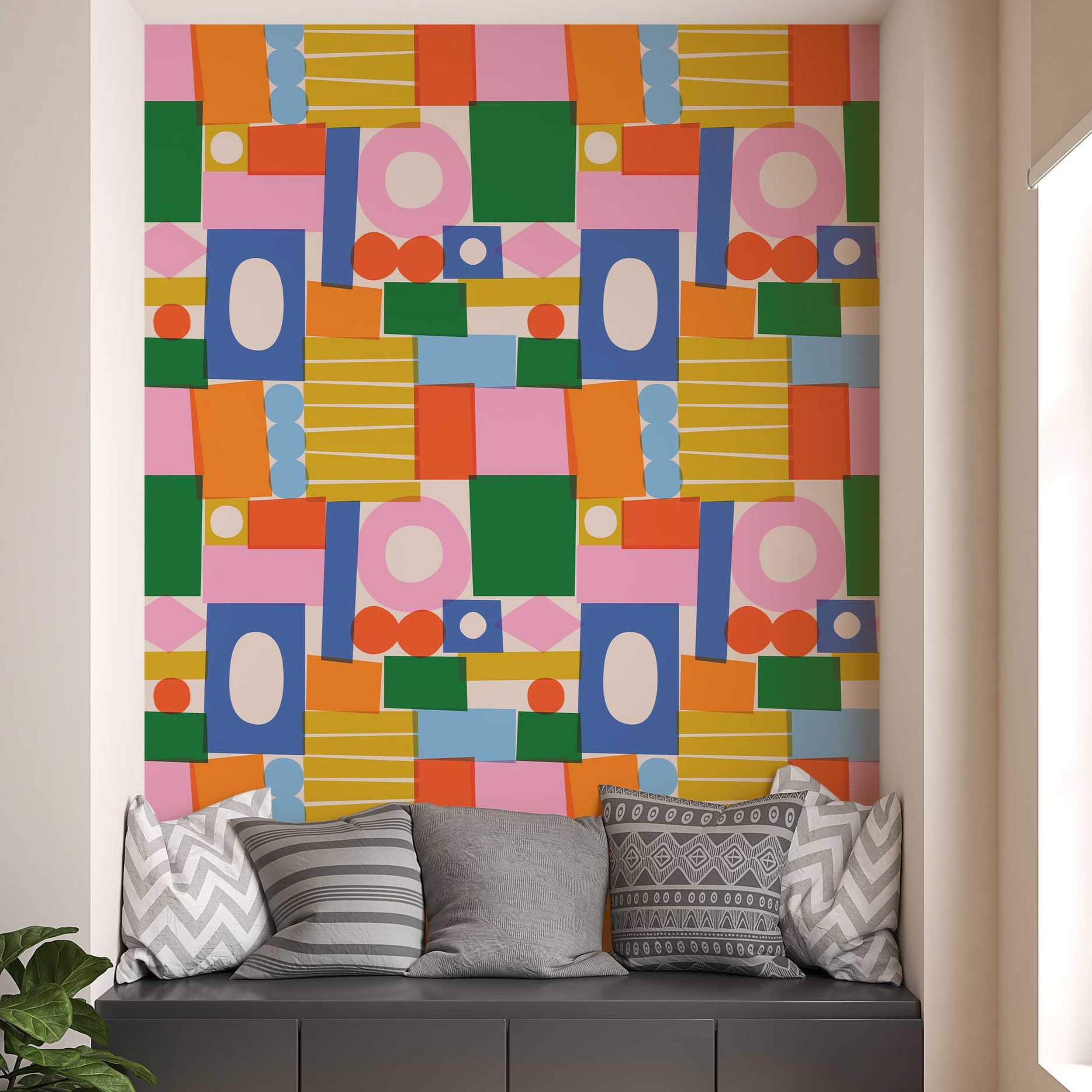 Abstract geometric wallpaper featuring overlapping block shapes like rectangles, circles, and ovals in pink, orange, green, blue, and yellow.