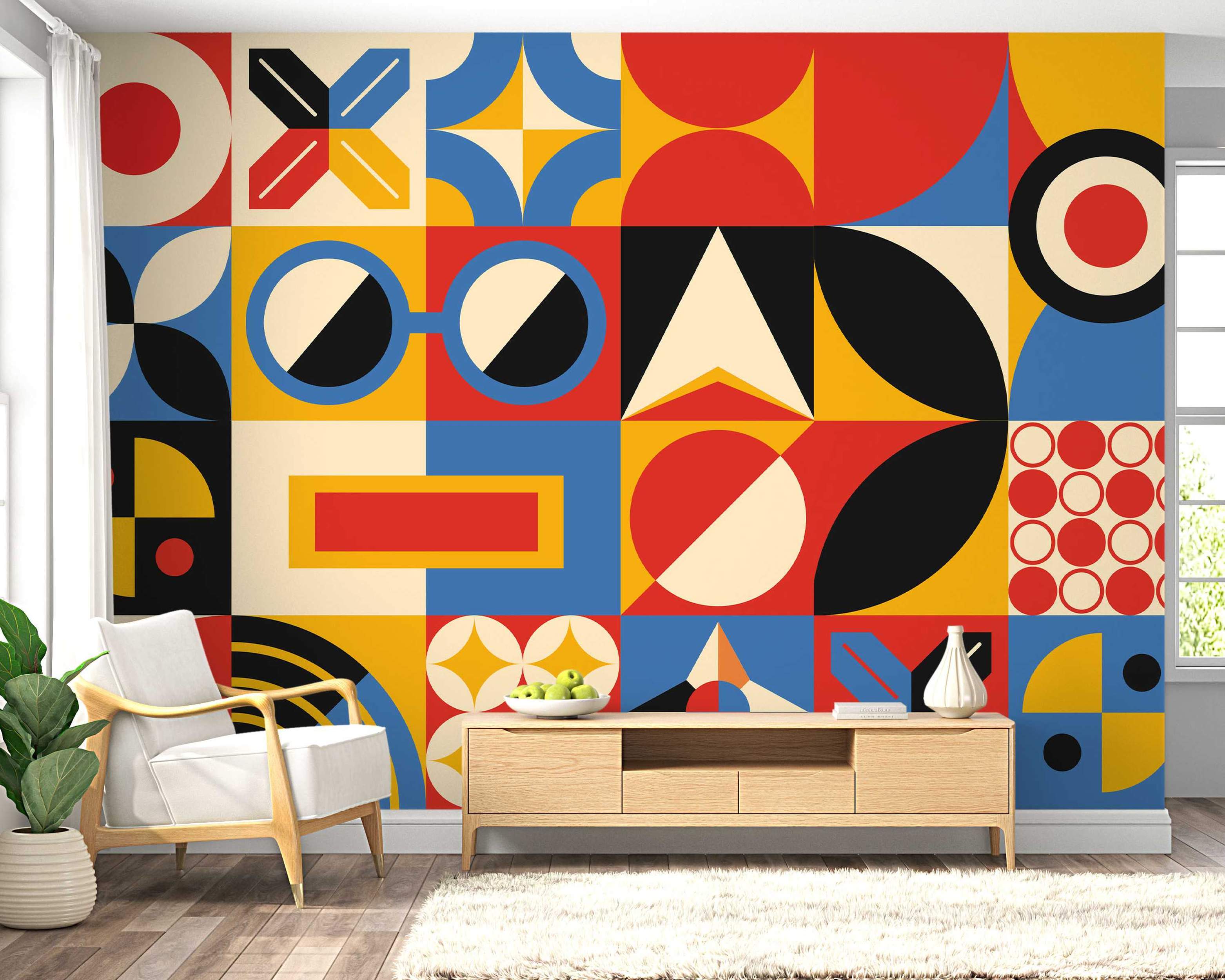 Mural featuring a grid of bold geometric shapes including circles, triangles, and rectangles in red, blue, yellow, black, and cream.