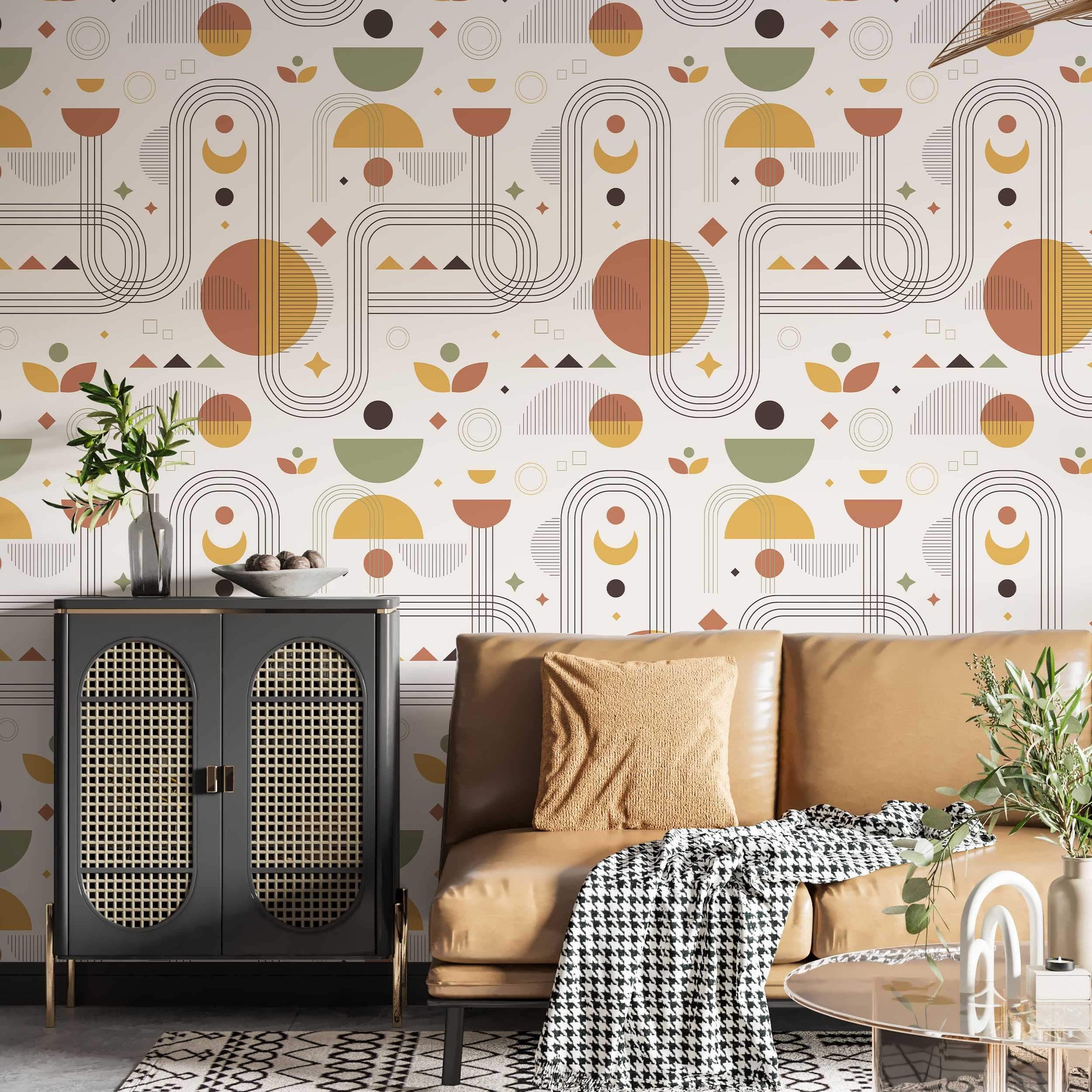 Repeating wallpaper pattern of geometric shapes like arches, semi-circles, and lines in earthy rust, yellow, and green tones.
