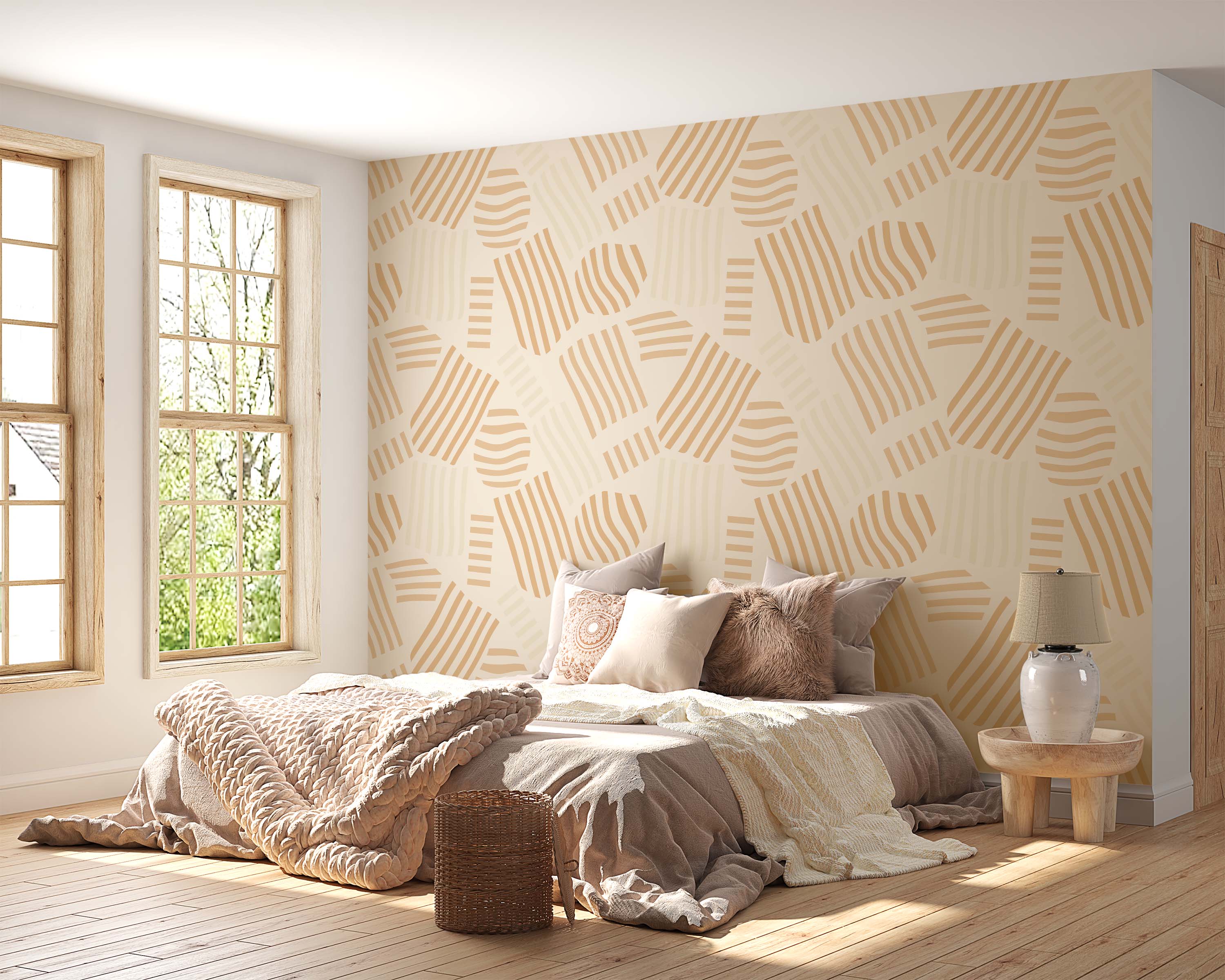 Geometric wallpaper with a repeating pattern of striped abstract shapes in tan and beige on a cream background.