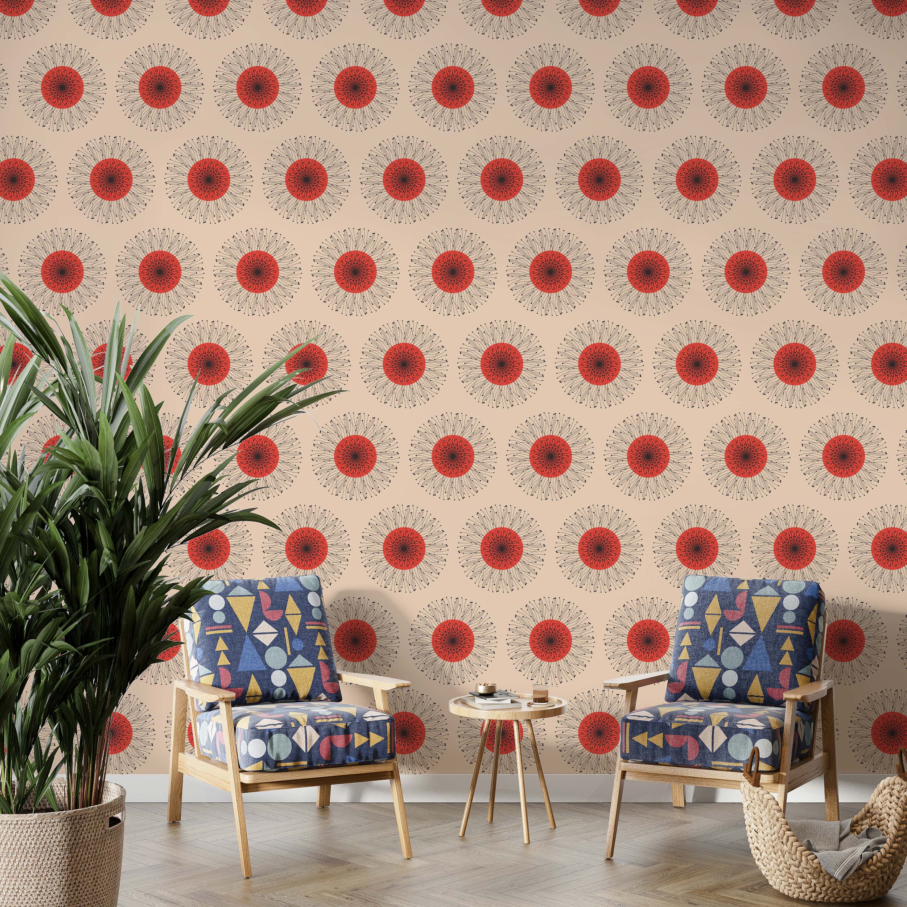 A geometric wallpaper featuring repeating red and black sunburst medallions on a light beige background.