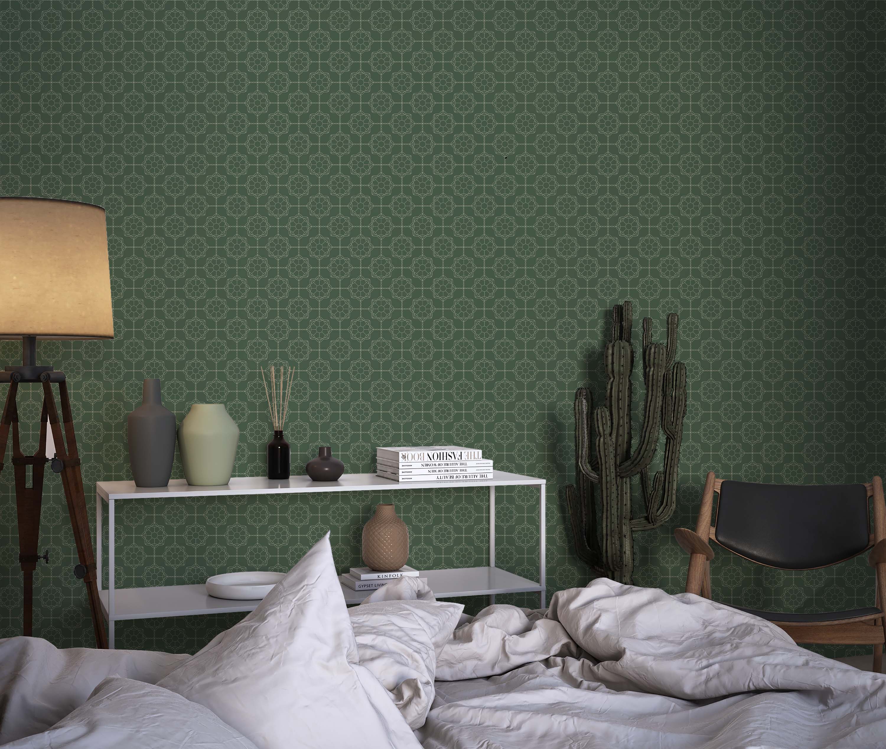A geometric wallpaper with an intricate, light green lattice pattern of repeating star-like shapes on a dark green background.