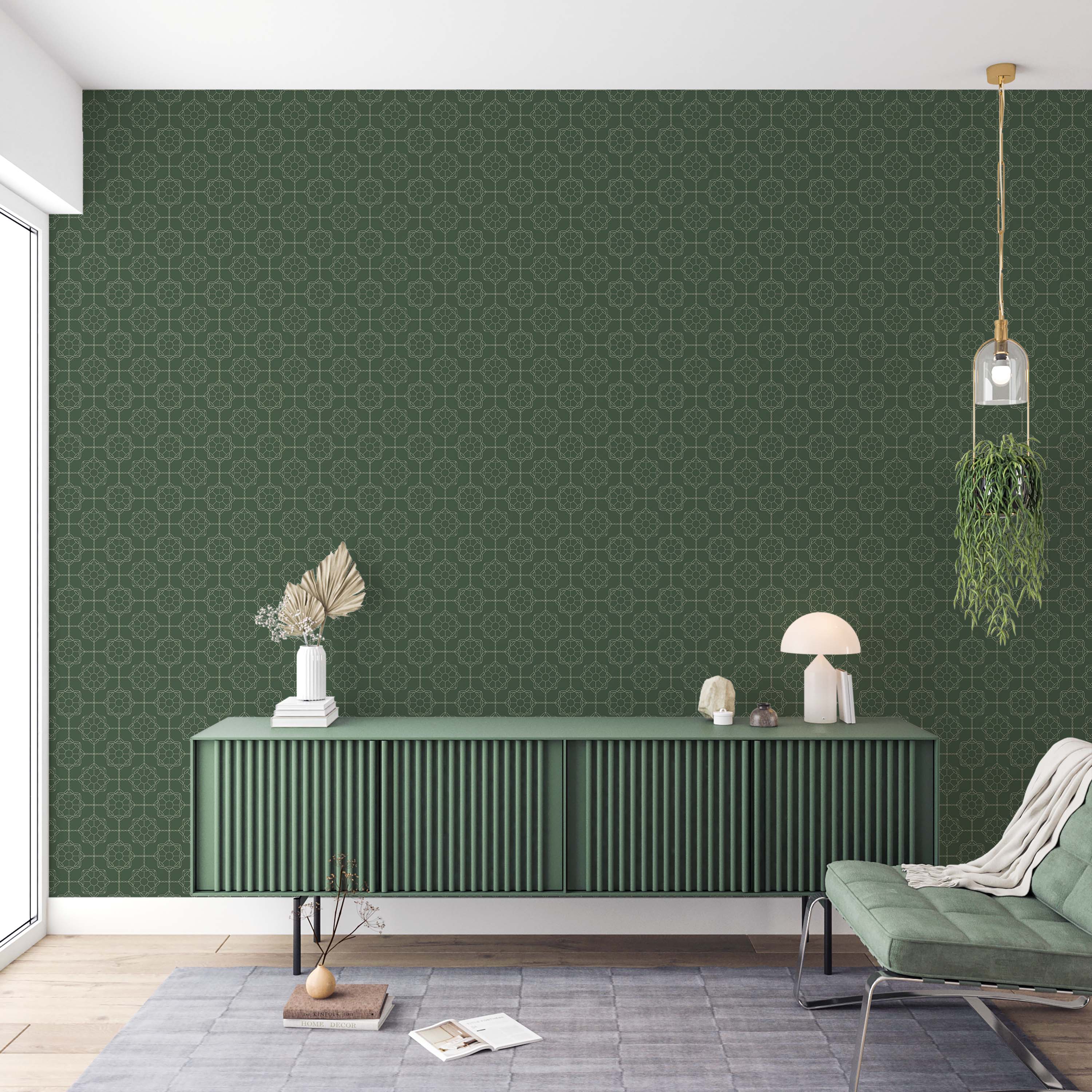 A geometric wallpaper with an interlocking tile pattern of rosettes in light green on a dark, forest green background.