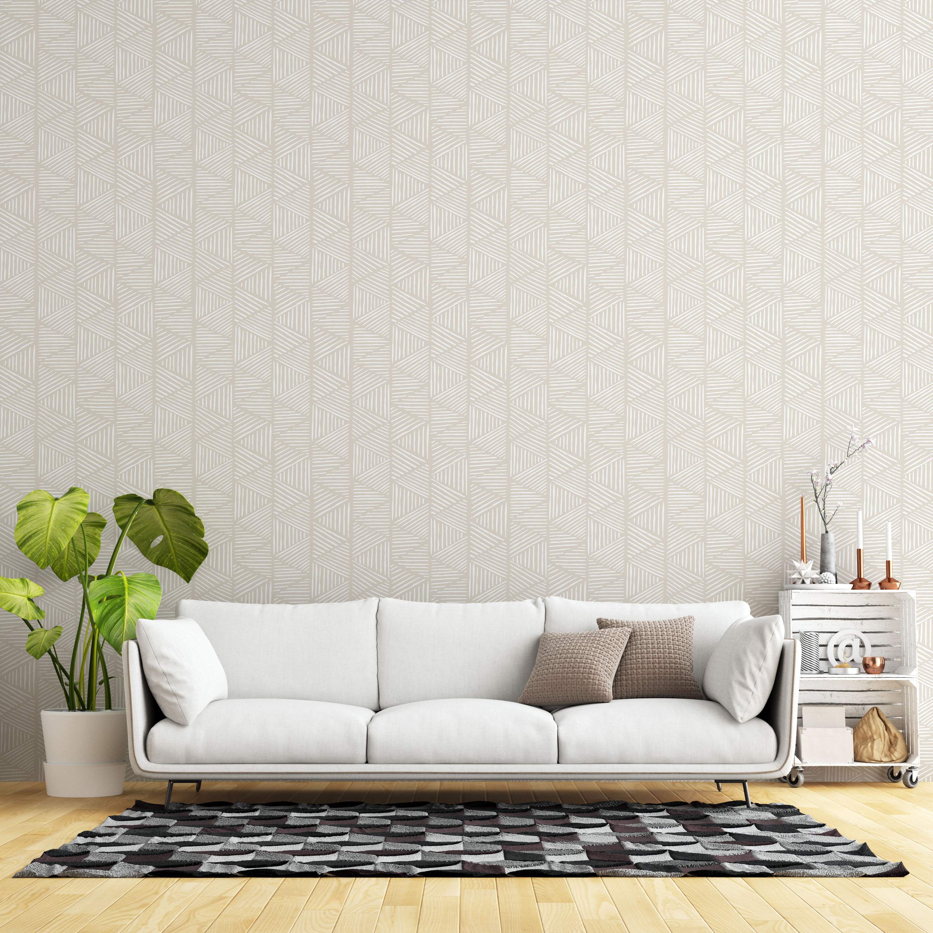 Geometric wallpaper featuring triangles composed of sketchy white lines on a neutral beige background.