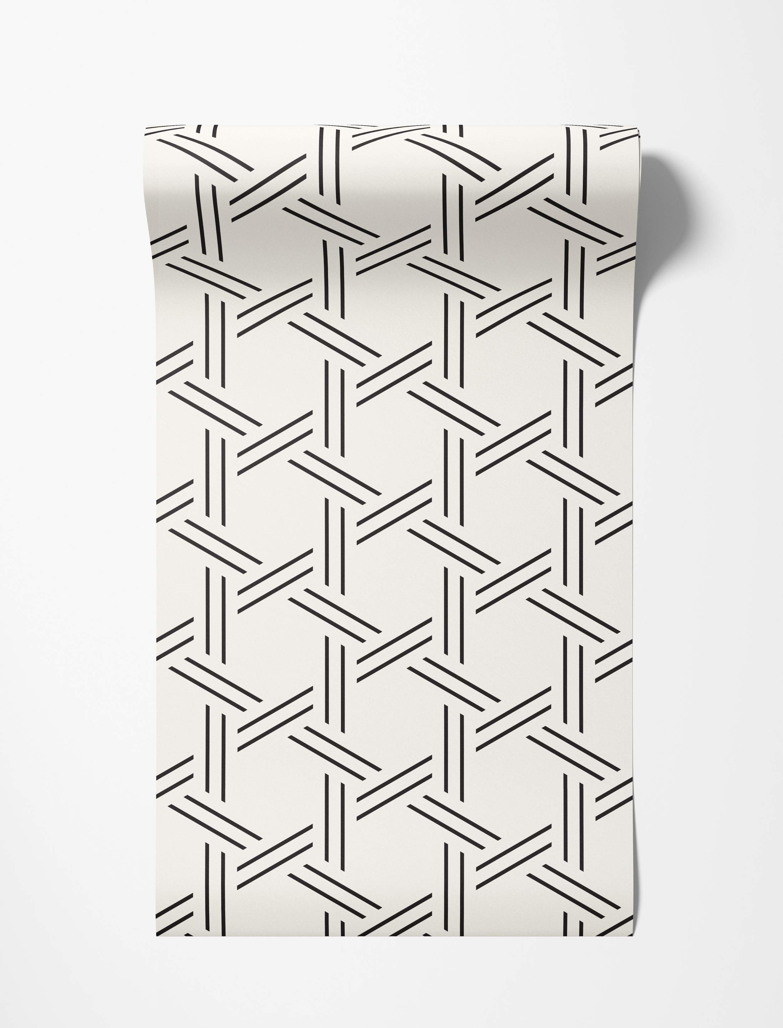 Geometric wallpaper featuring thin black lines forming an interlocking woven pattern on an off-white background.