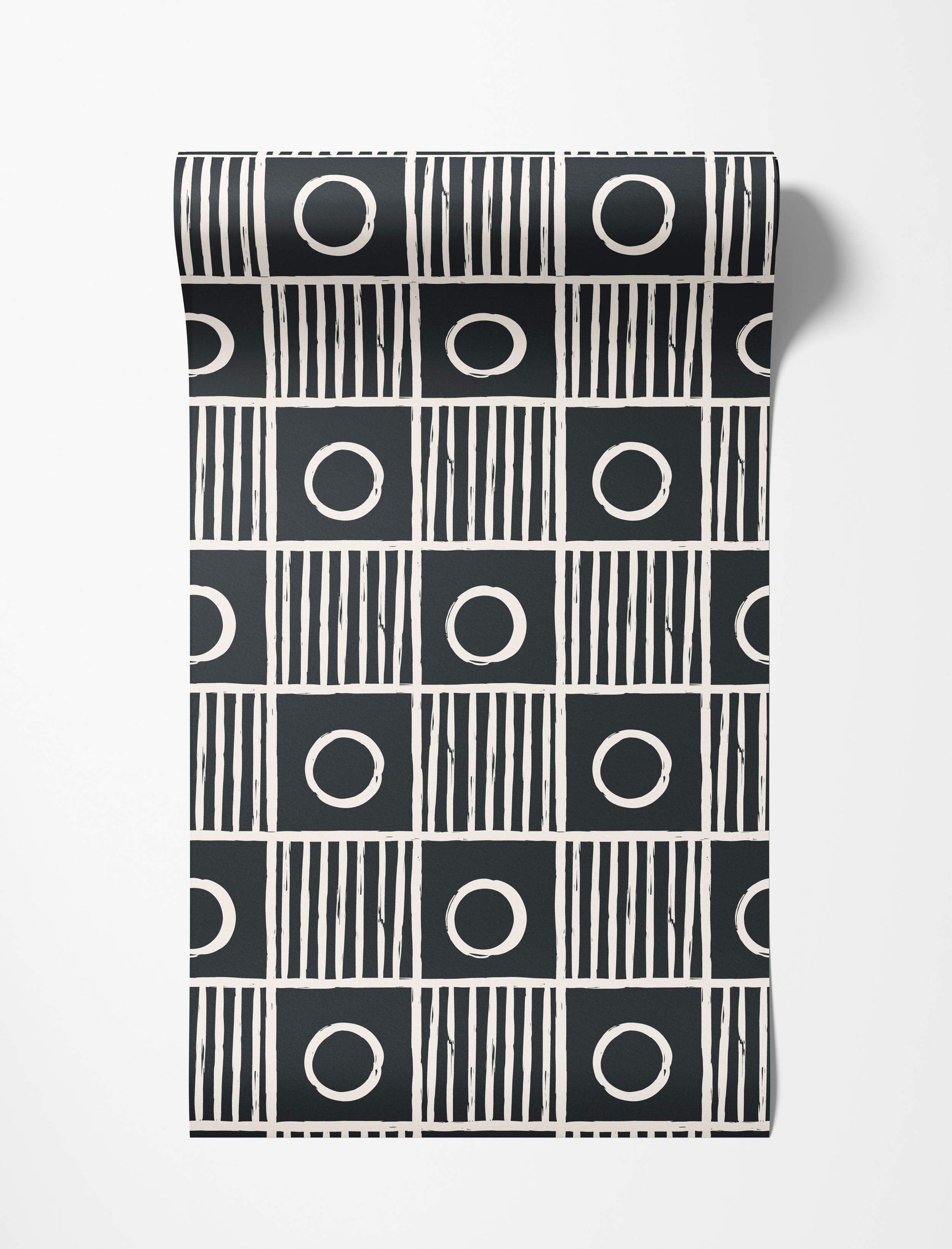 Geometric wallpaper featuring a black grid with alternating squares of off-white vertical stripes and central off-white circles.
