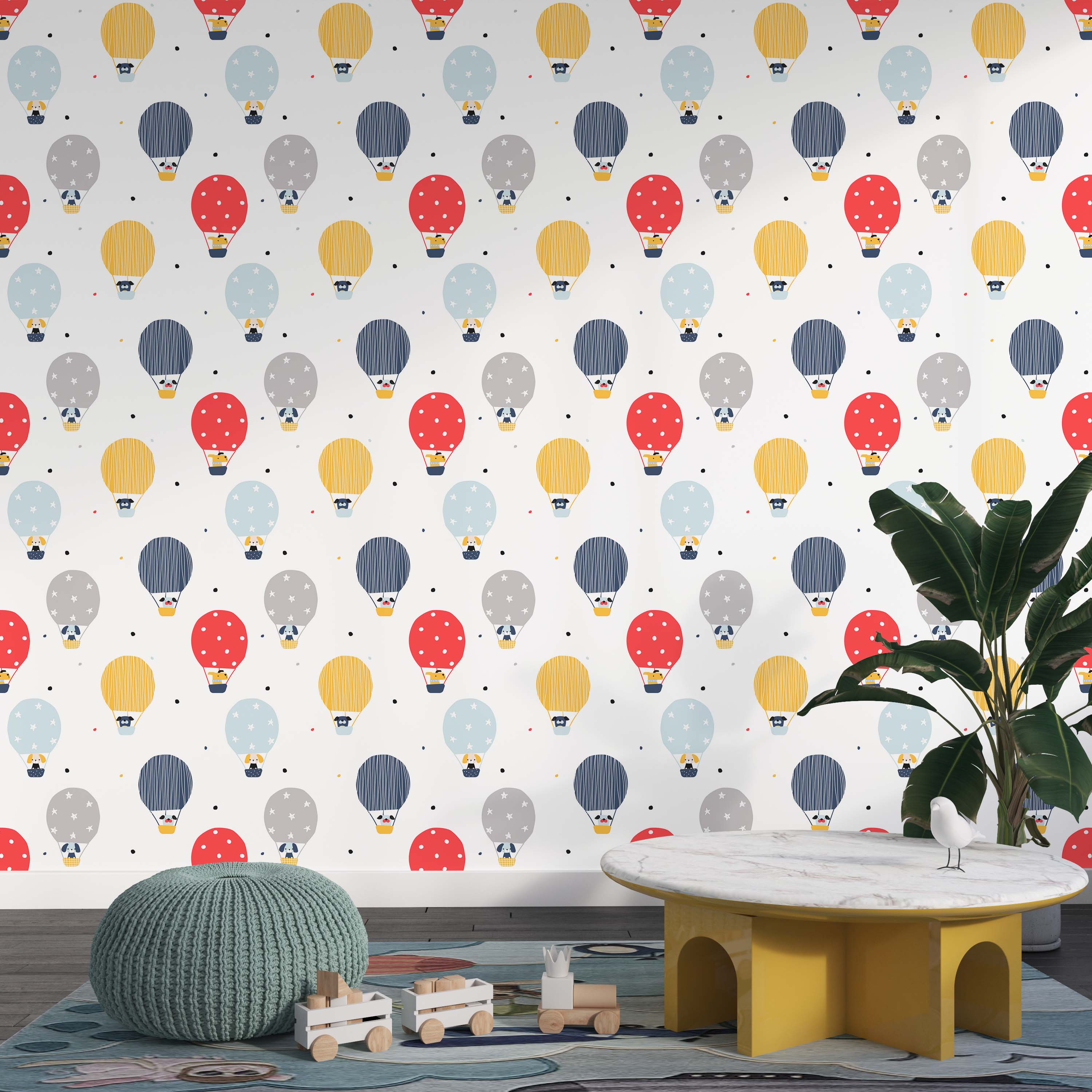 Wallpaper with a playful pattern of red, yellow, blue, and gray hot air balloons, each carrying a dog, on a white background with dots.
