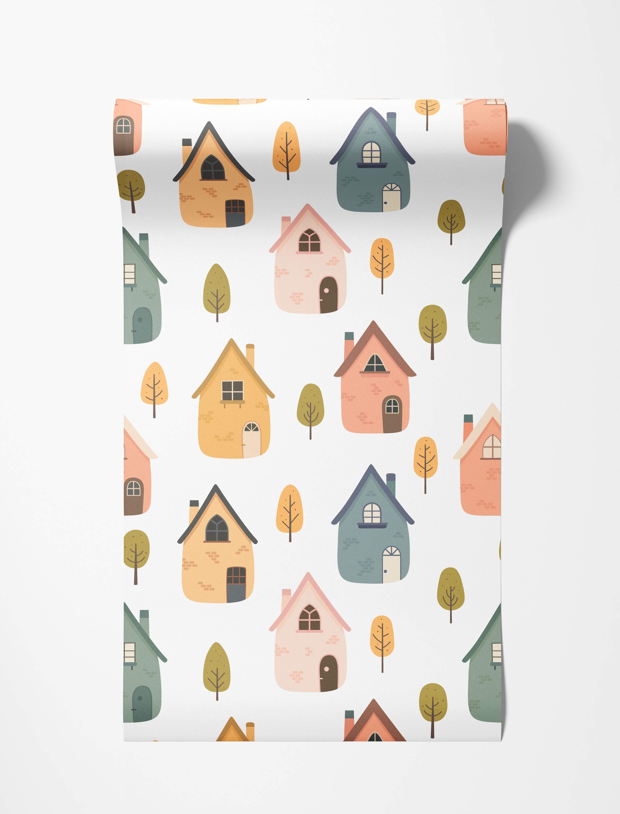 Whimsical wallpaper featuring a repeating pattern of illustrated houses and trees in yellow, blue, pink, and green on white.