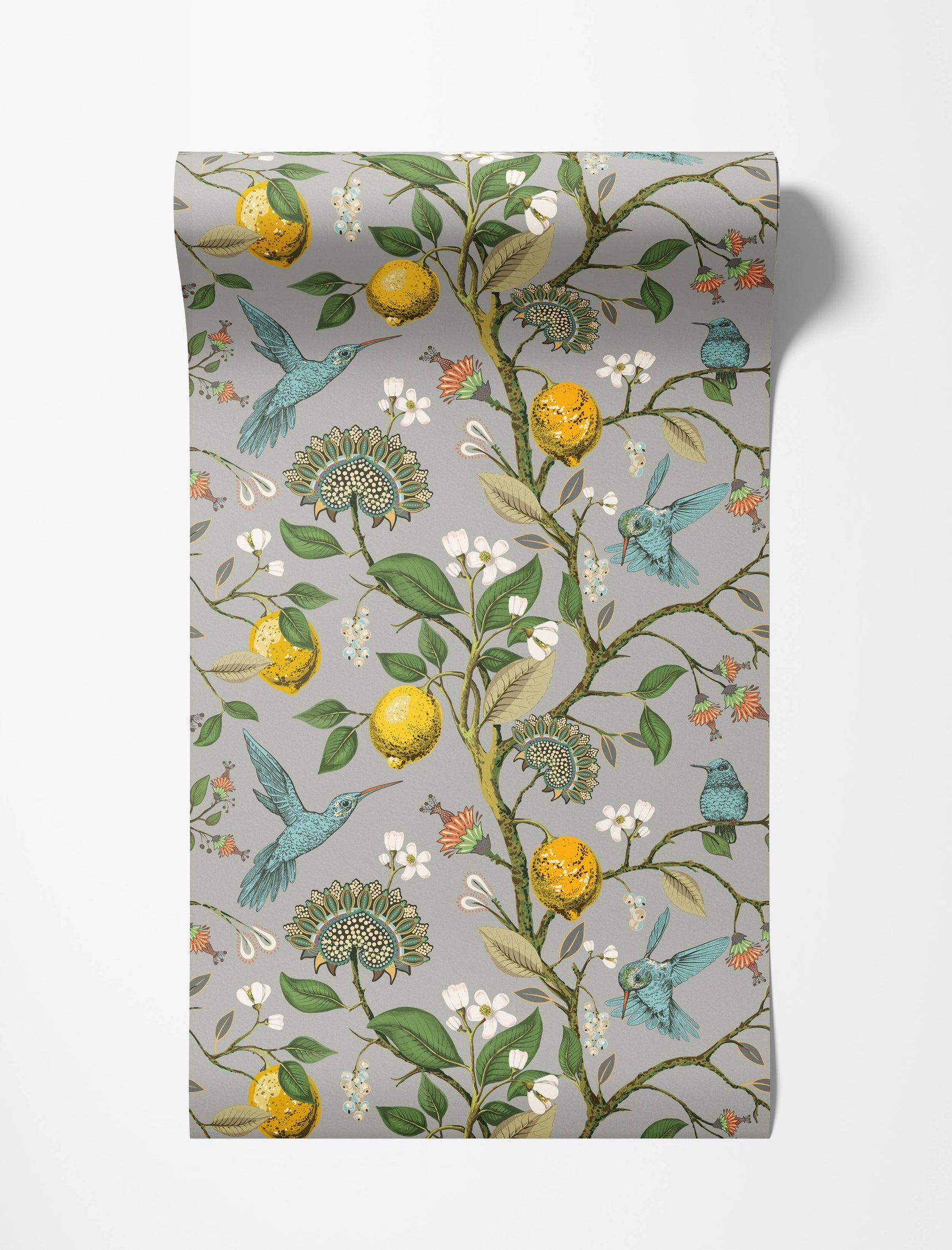 A botanical wallpaper with blue hummingbirds, yellow lemons, and stylized flowers on a gray background.