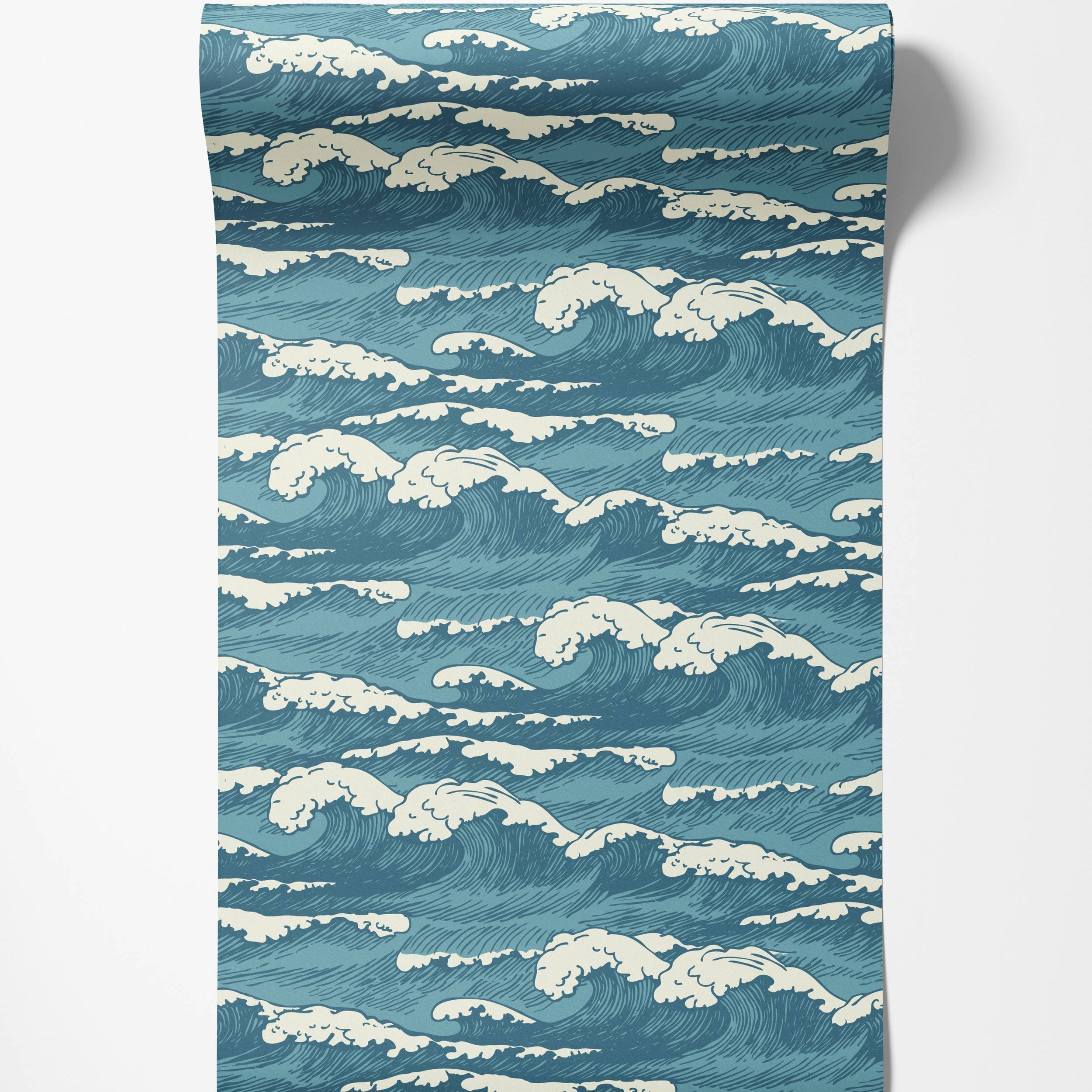 Wallpaper featuring a repeating pattern of stylized Japanese ocean waves in shades of blue with cream-colored foam.