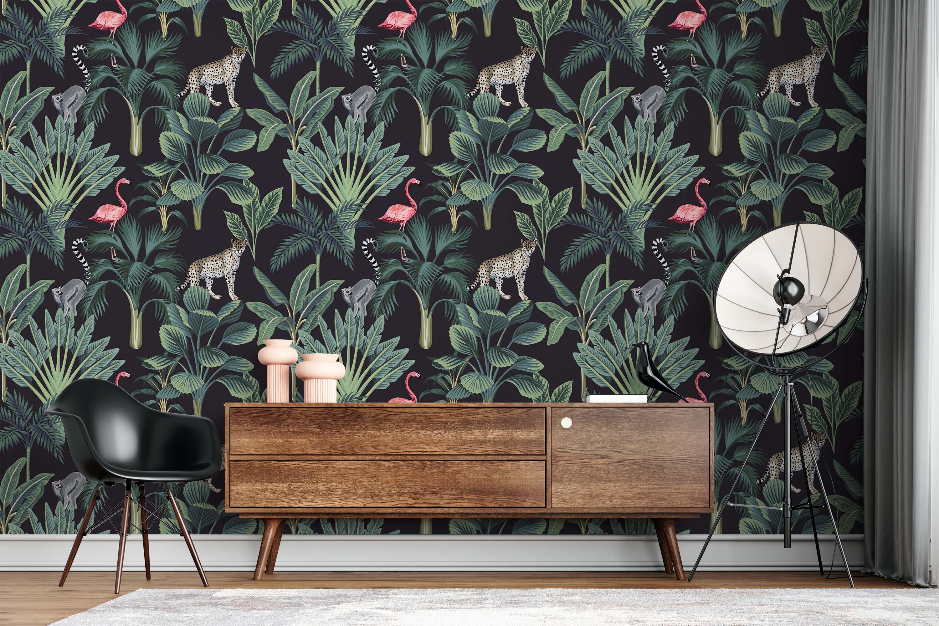 A tropical animal wallpaper with leopards, lemurs, and pink flamingos amongst green jungle foliage on a dark background.