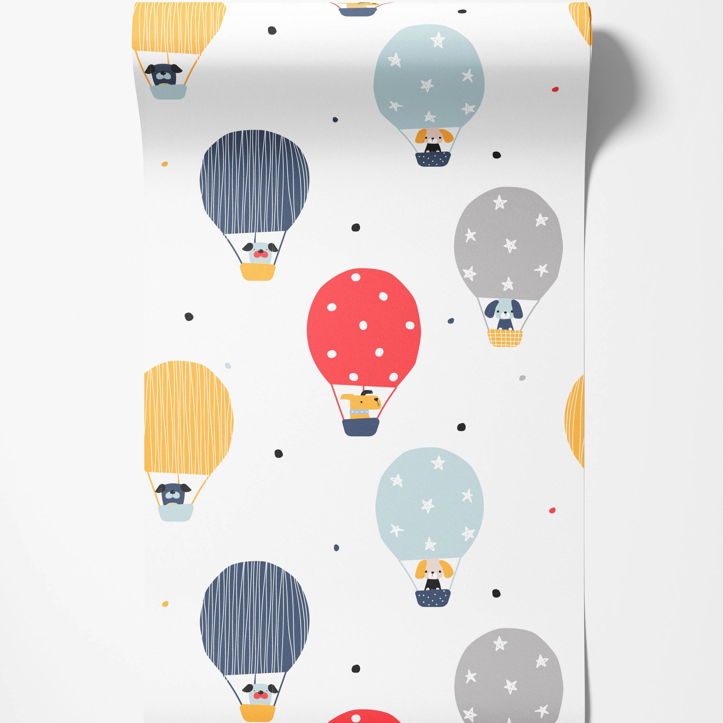 Kids wallpaper: cartoon dogs in colorful hot air balloons (yellow, blue, red, gray) with stripes, stars, dots on white.
