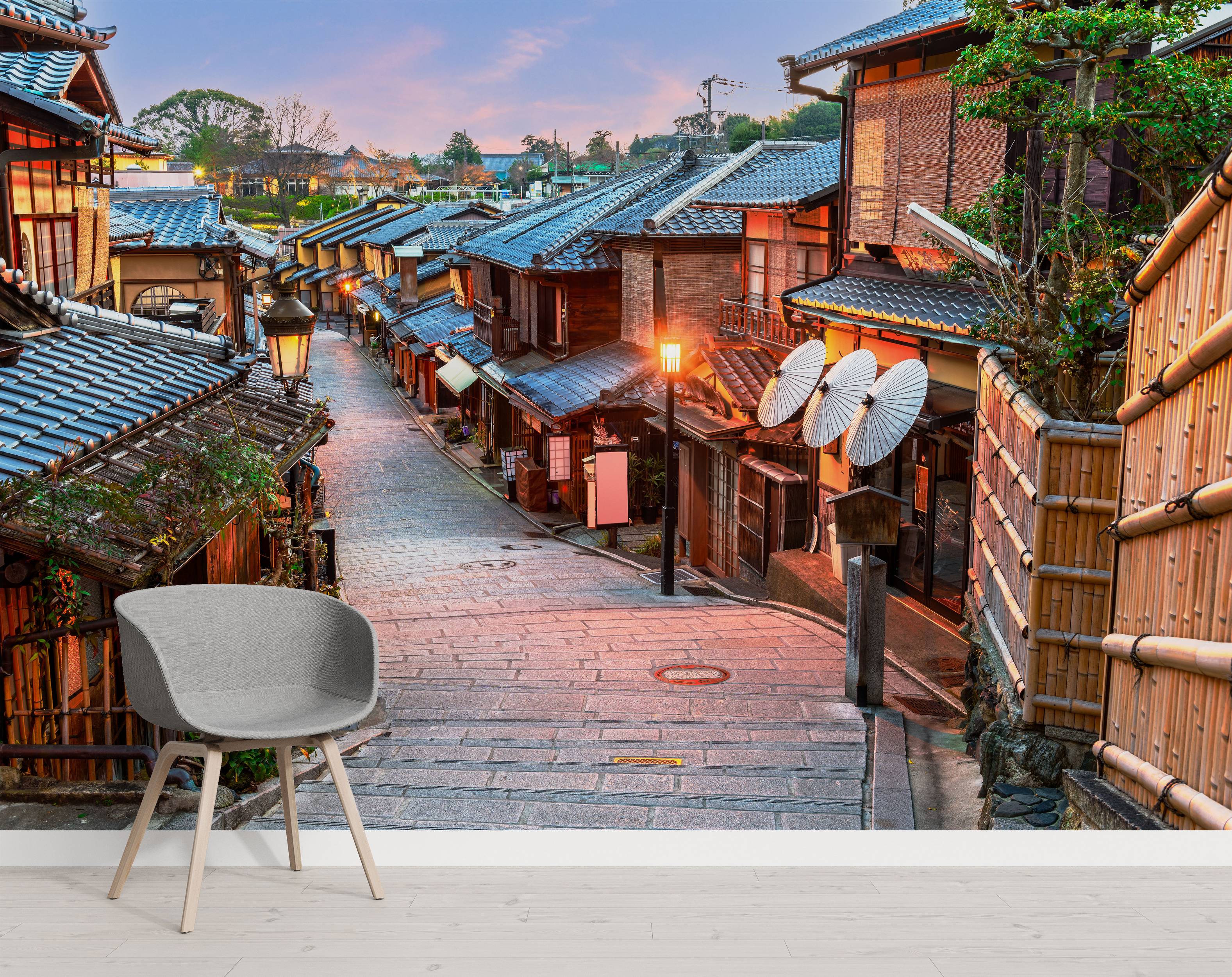 A scenic mural of a historic Japanese street in Kyoto at dusk. The stone path is lined with traditional wooden buildings.