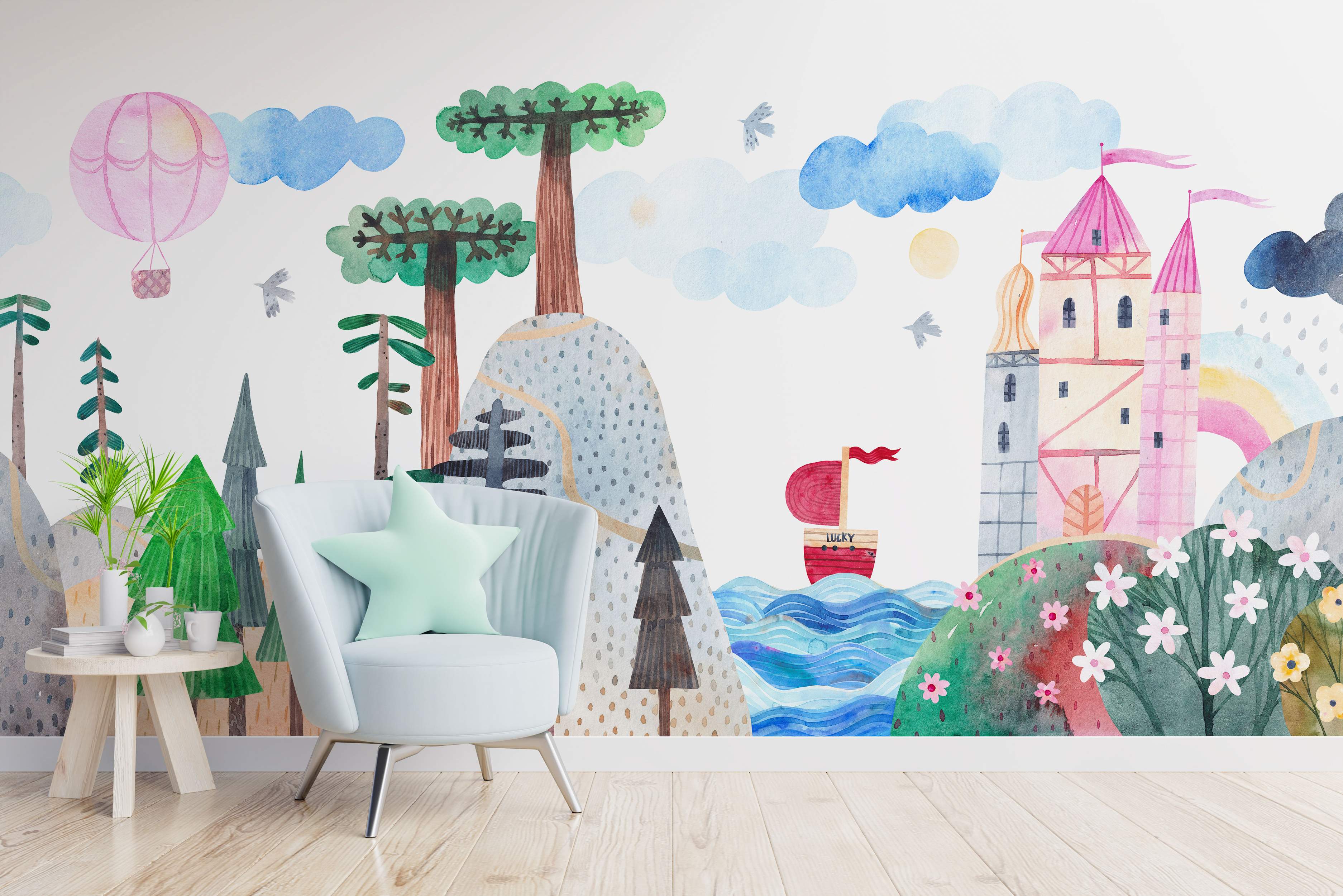 Whimsical watercolor landscape mural featuring a pink castle, trees, blue sea, hot air balloon, rainbow, and flowers.