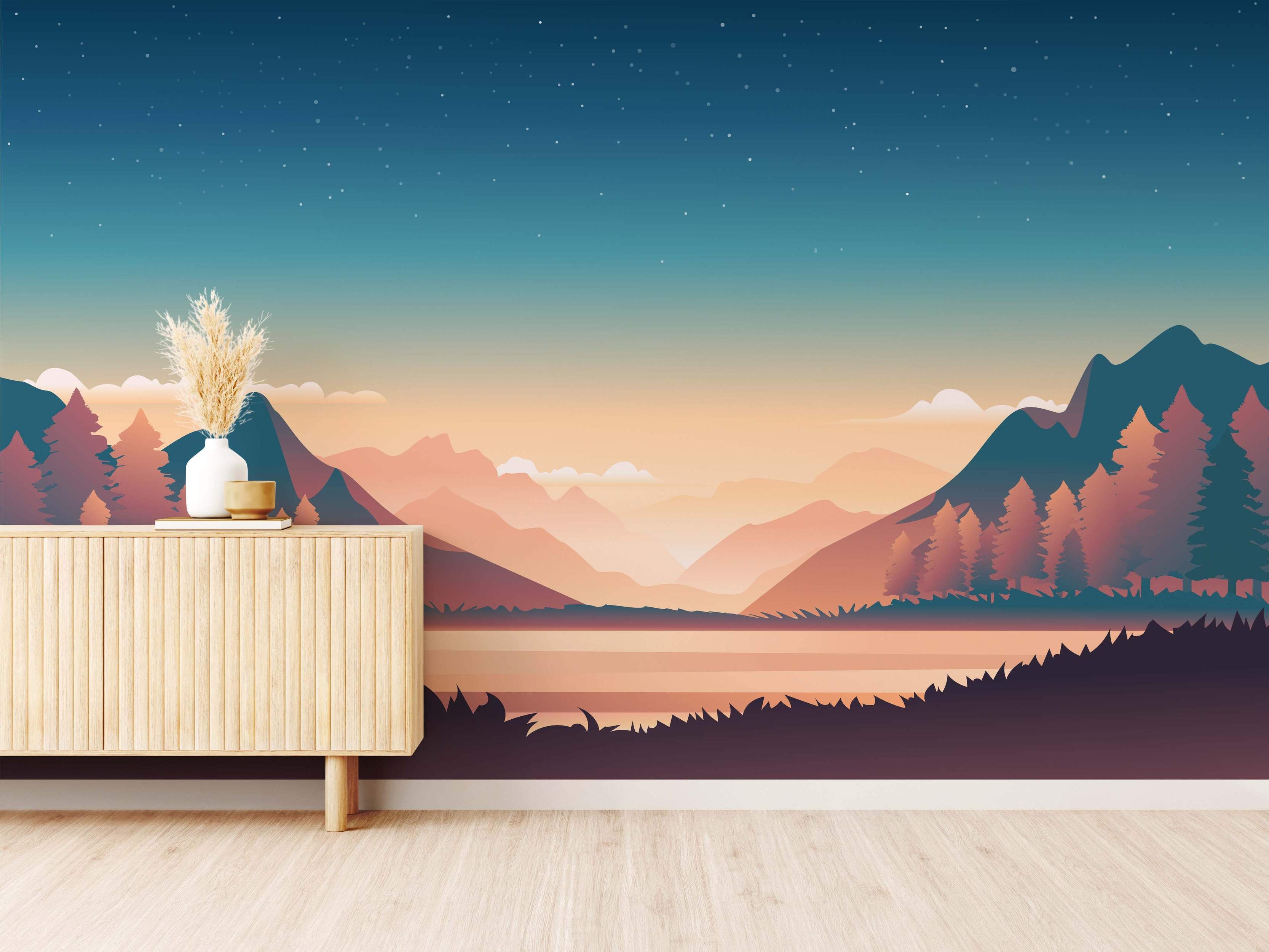 Minimalist mountain landscape mural featuring layered peaks, pine trees, and a lake under a starry blue-to-orange gradient sky.