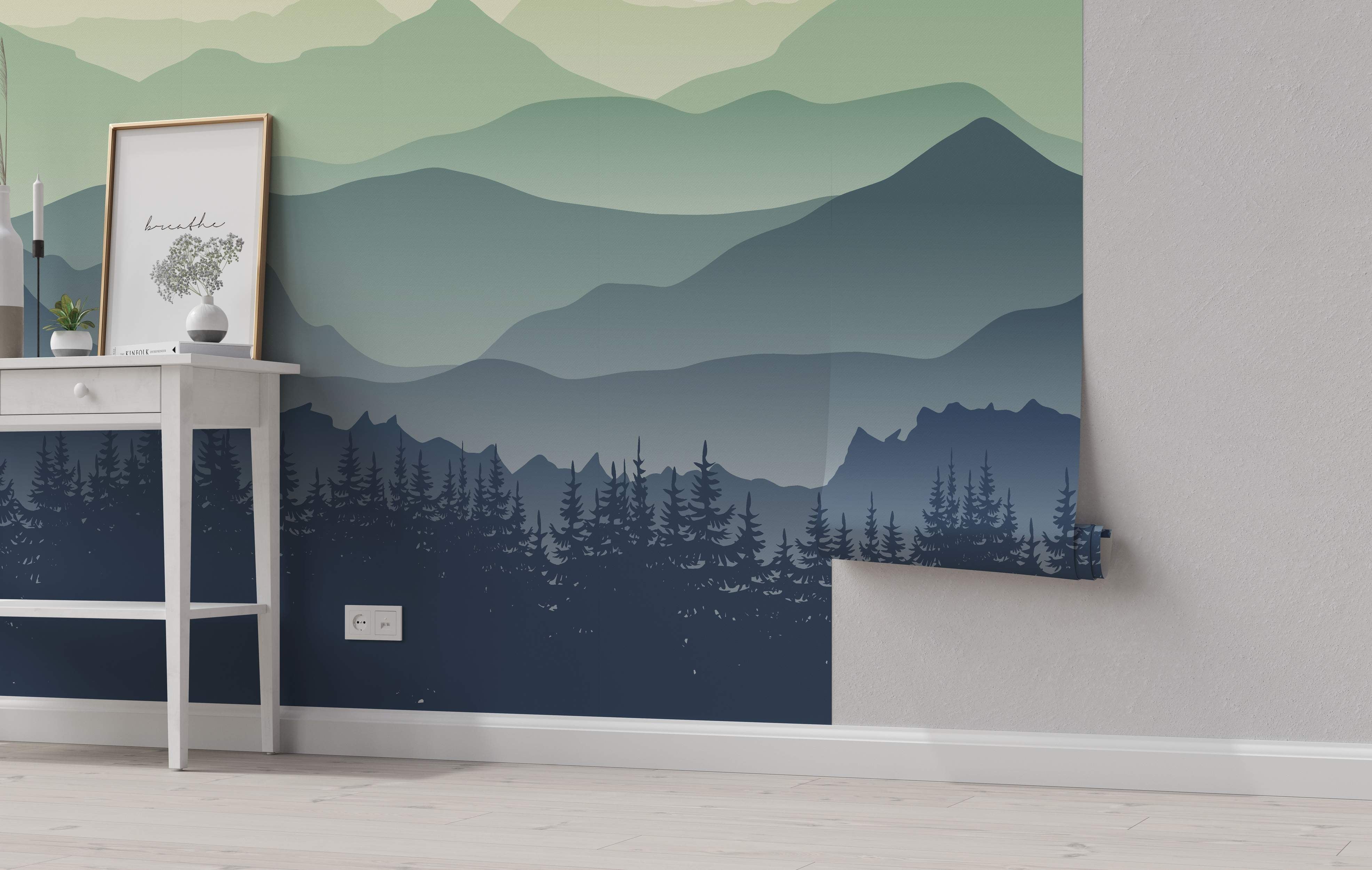 Mural depicting layered mountains in green and blue gradients above a dark blue pine tree forest silhouette.