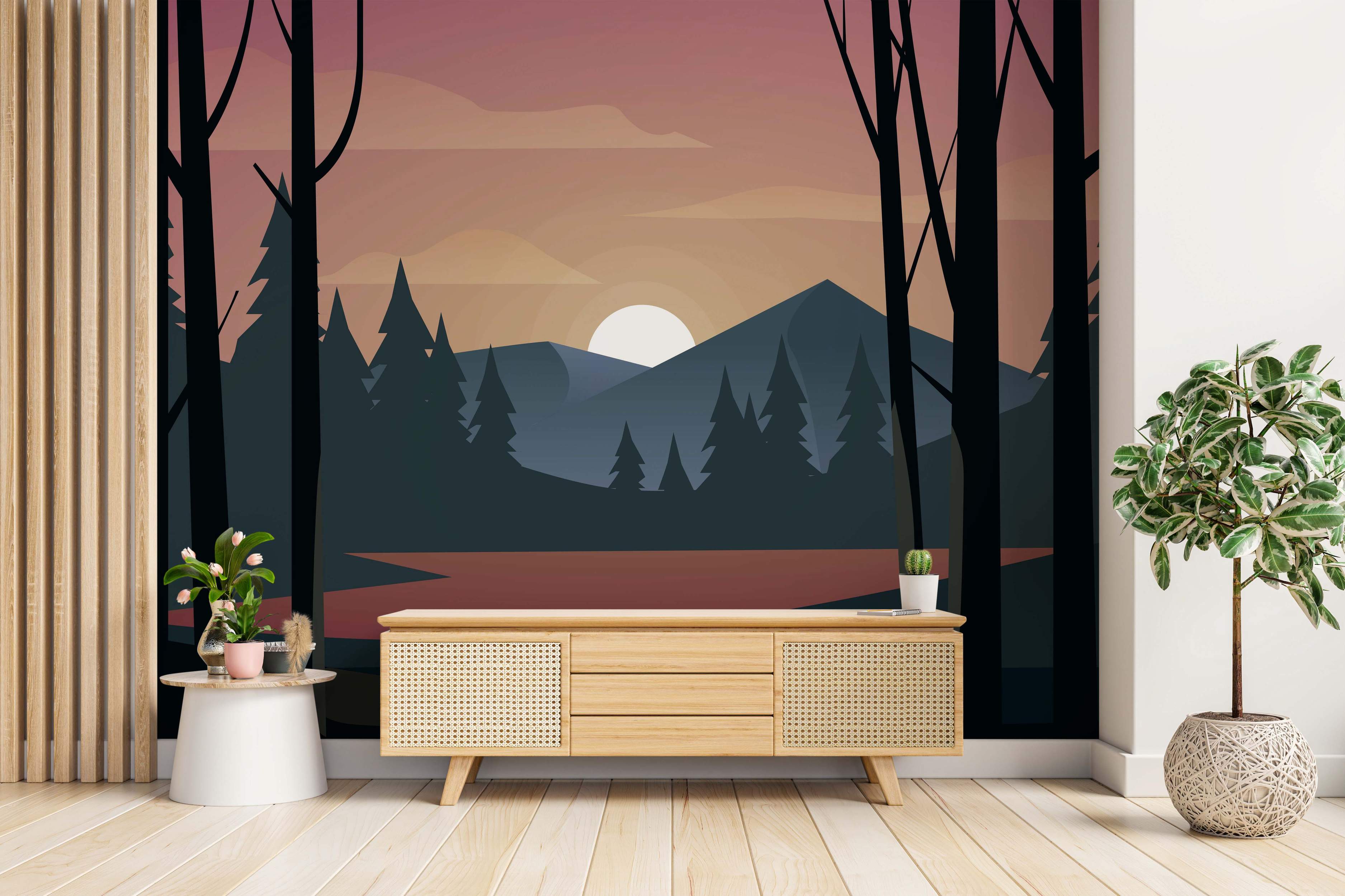Minimalist landscape mural showing a pink and orange sunset over blue mountains and a dark forest reflected in water.