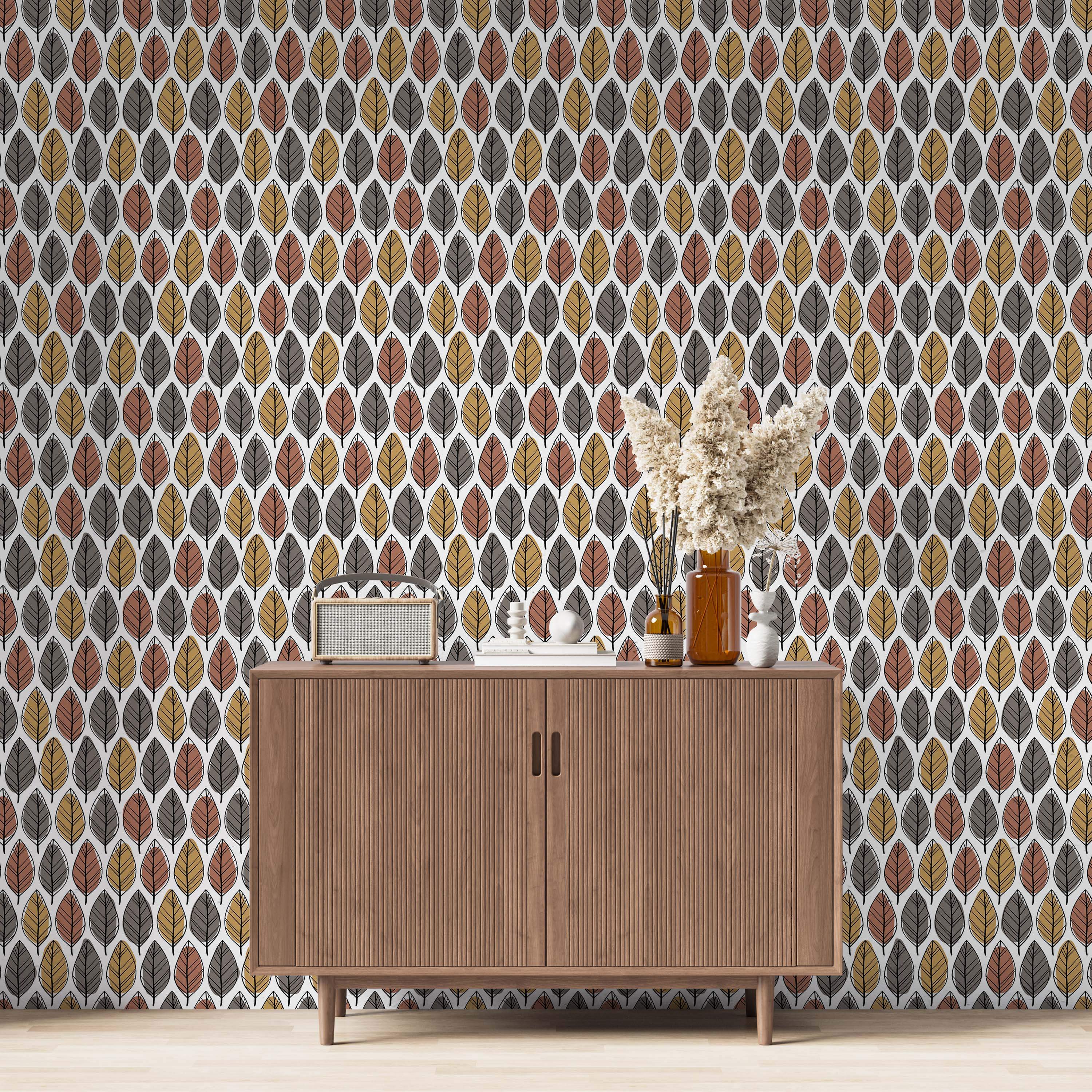 Wallpaper features a repeating pattern of stylized leaves in terracotta brown, golden yellow, and dark gray on a white background.