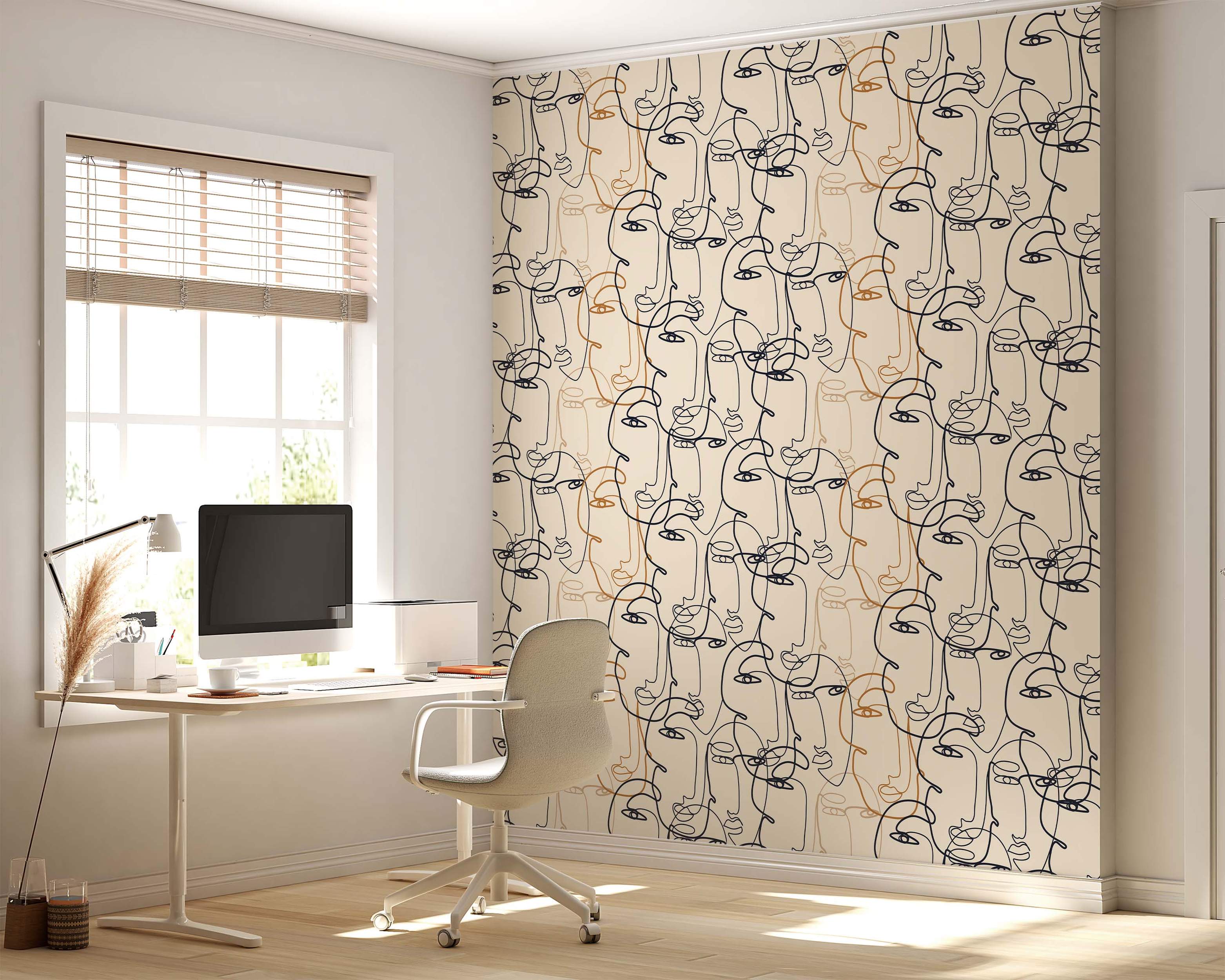 Wallpaper featuring abstract, overlapping faces in a continuous line art style with black and brown lines on a beige background.