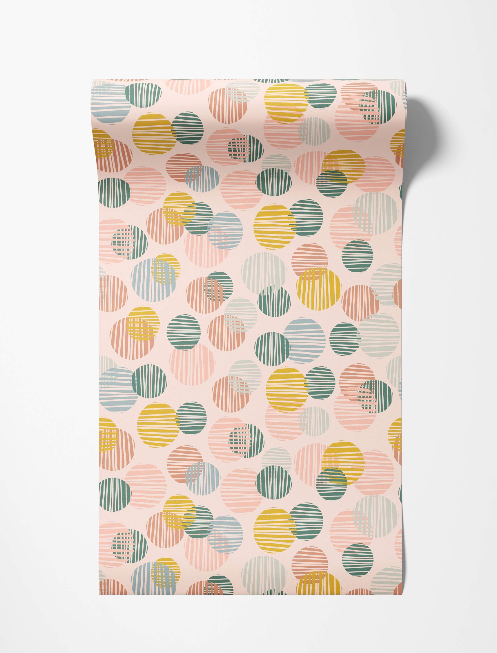 Wallpaper featuring overlapping circles in pastel pink, blue, green, and yellow, filled with varied line textures on a pale pink background.