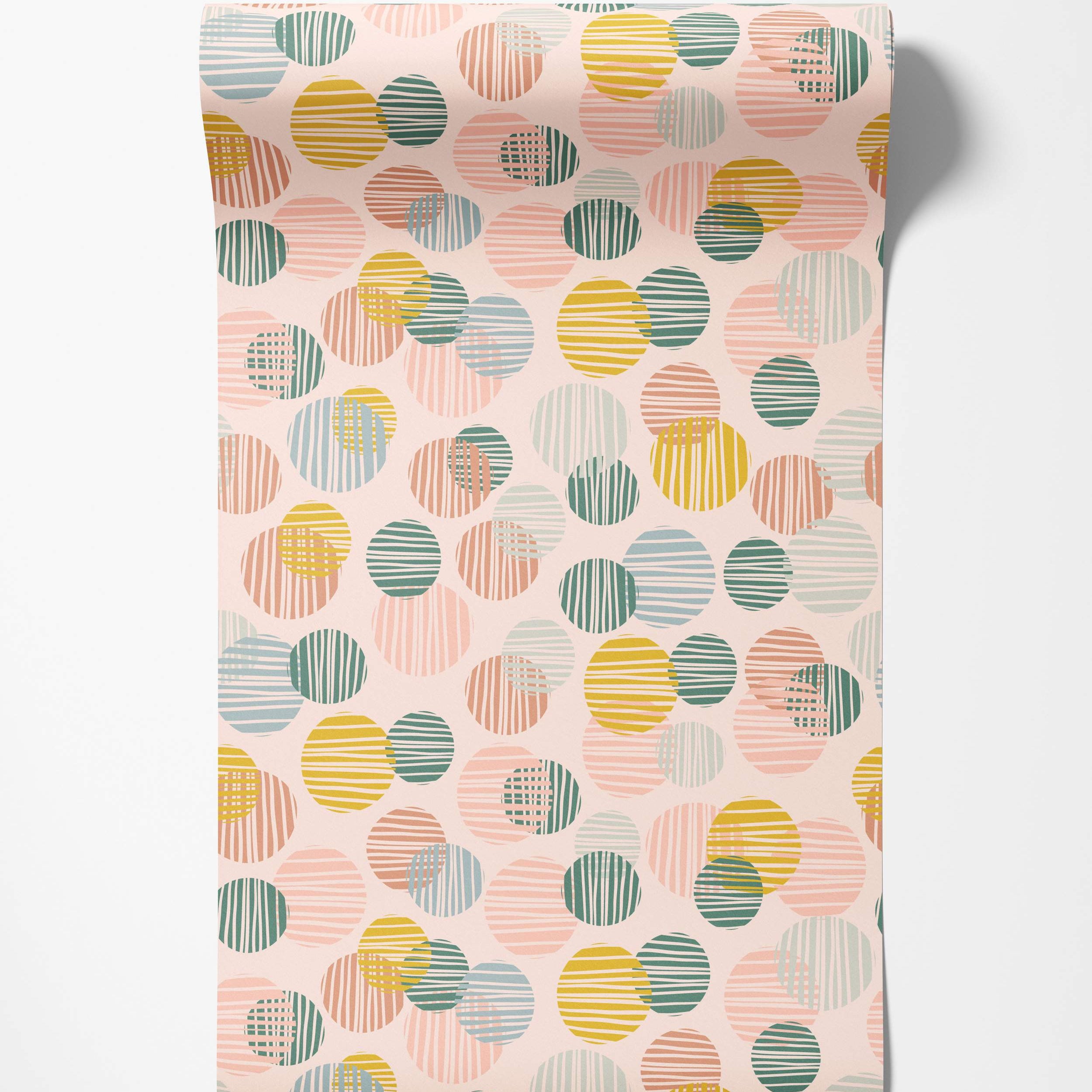Wallpaper featuring overlapping circles in pastel pink, blue, green, and yellow, filled with varied line textures on a pale pink background.