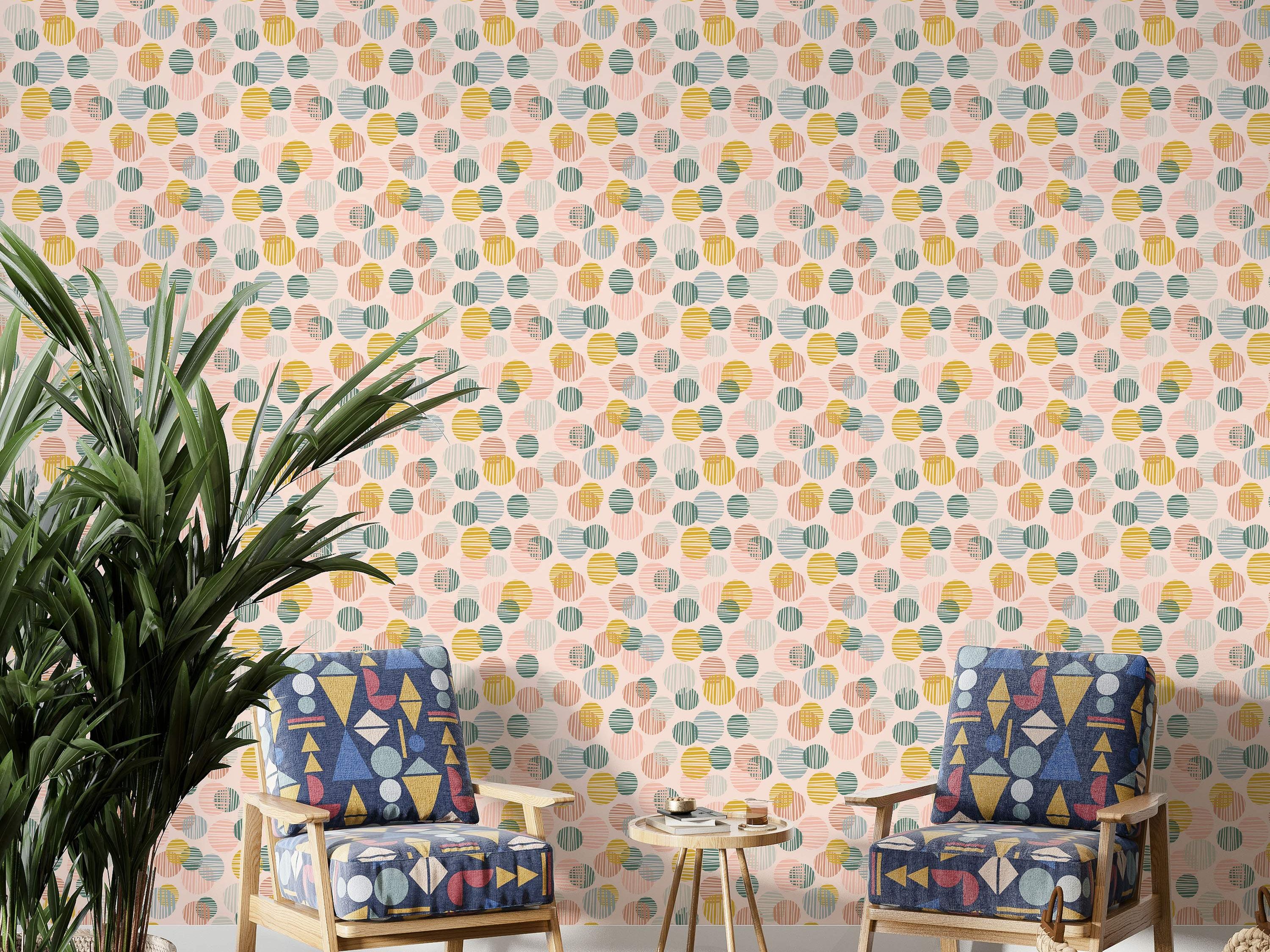 Wallpaper featuring overlapping circles filled with lines in pastel pink, yellow, teal green, and light blue on a pale background.