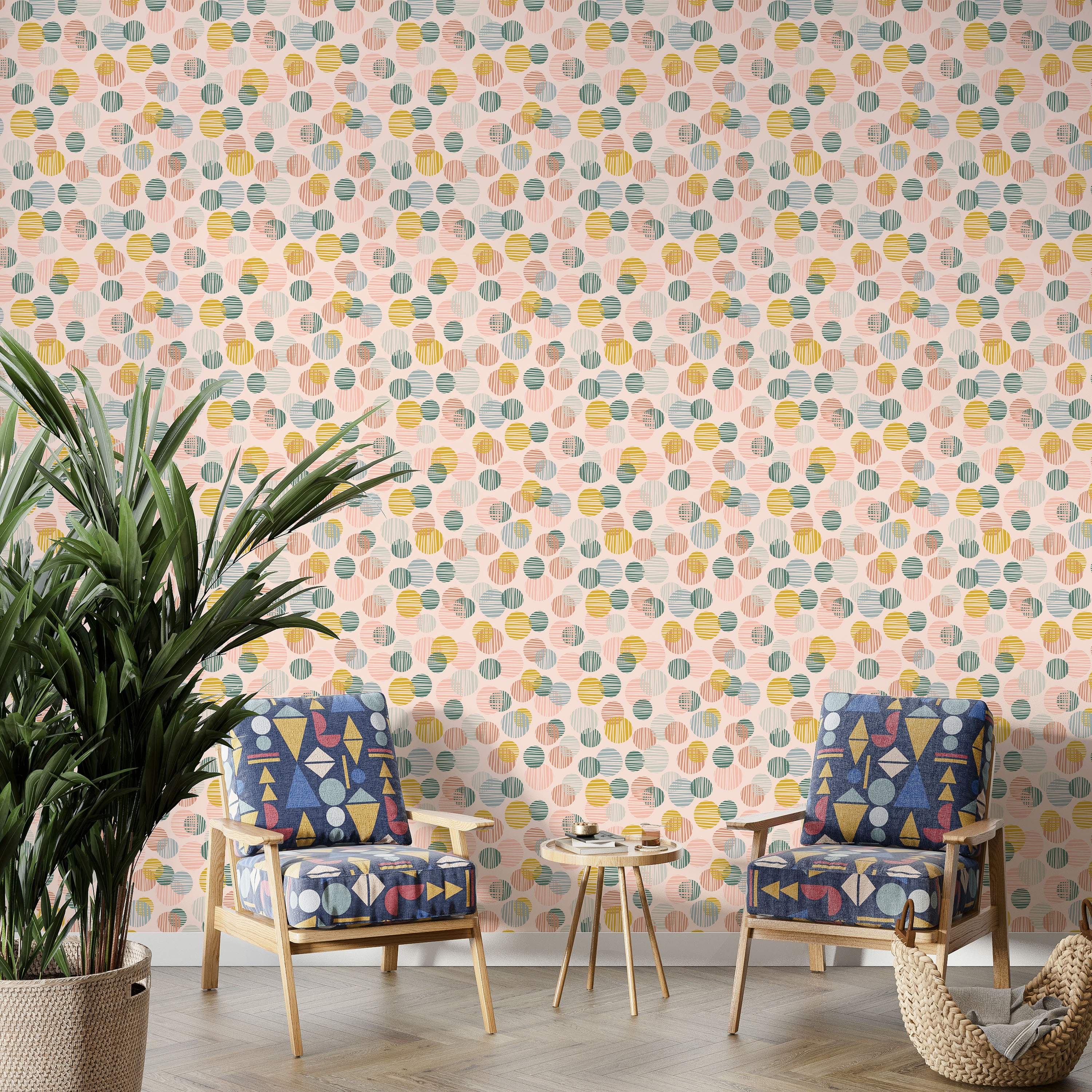 Wallpaper featuring overlapping circles filled with lines in pastel pink, yellow, teal green, and light blue on a pale background.