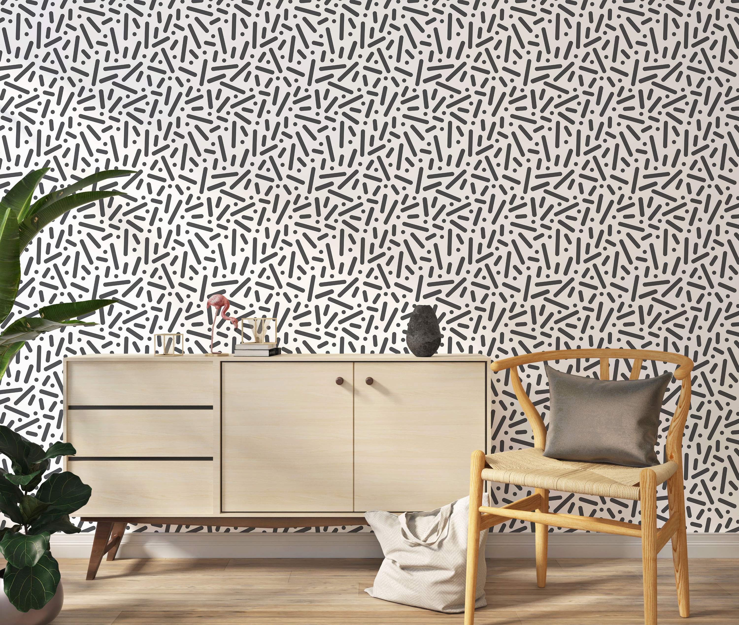 Wallpaper featuring a scattered abstract pattern of black rounded lines and dots on a white background.