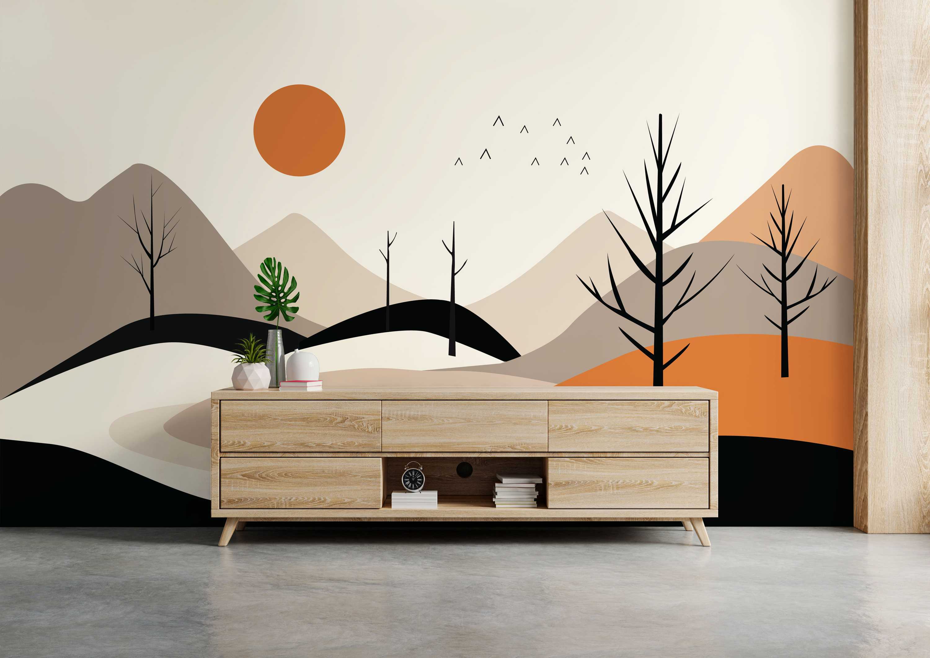 Minimalist mural featuring layered mountains in beige, brown, orange, and black, with bare trees, an orange sun, and birds.