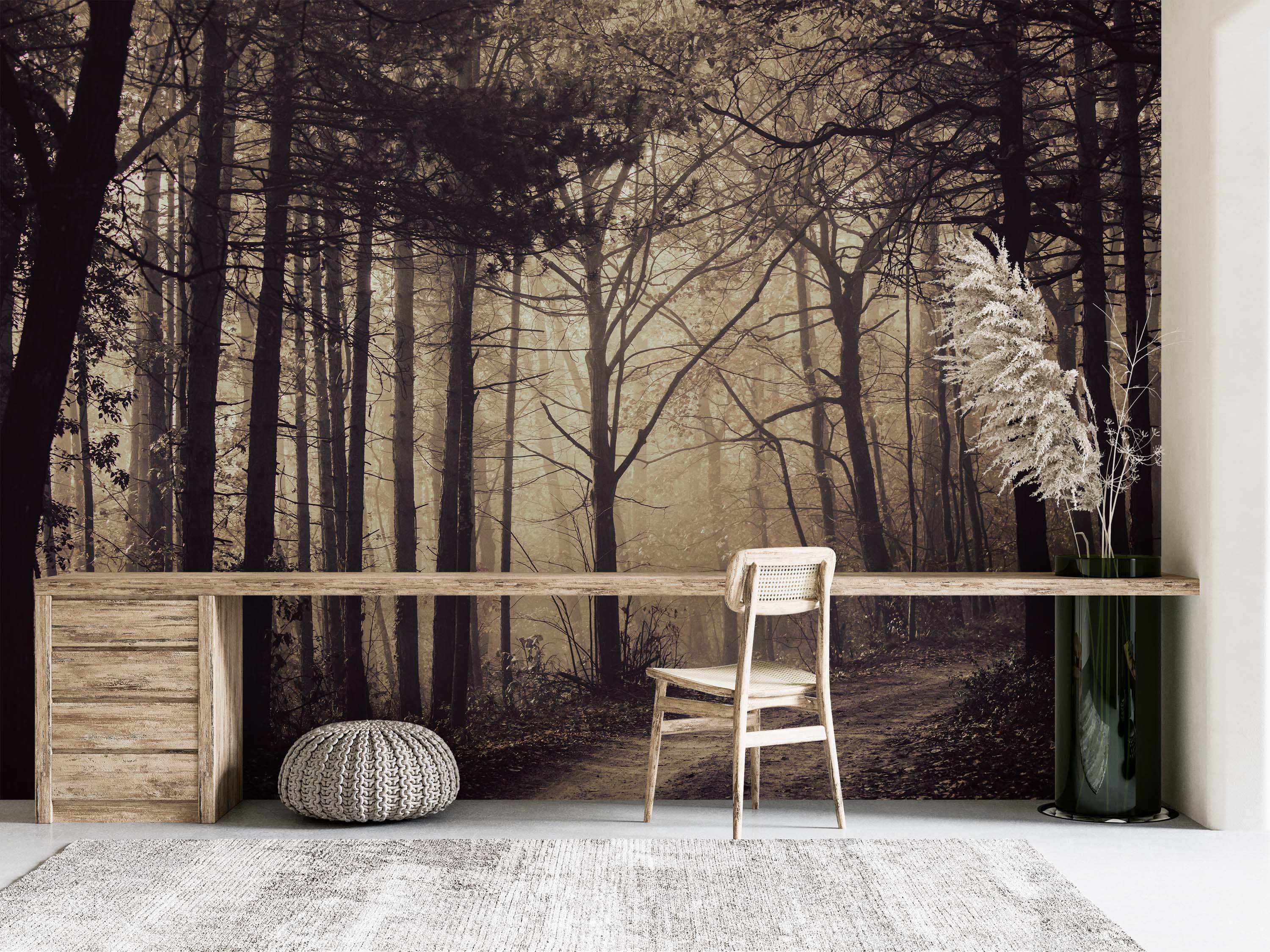 A moody, sepia-toned wall mural depicting a foggy forest path winding through tall, dark trees with bare branches.