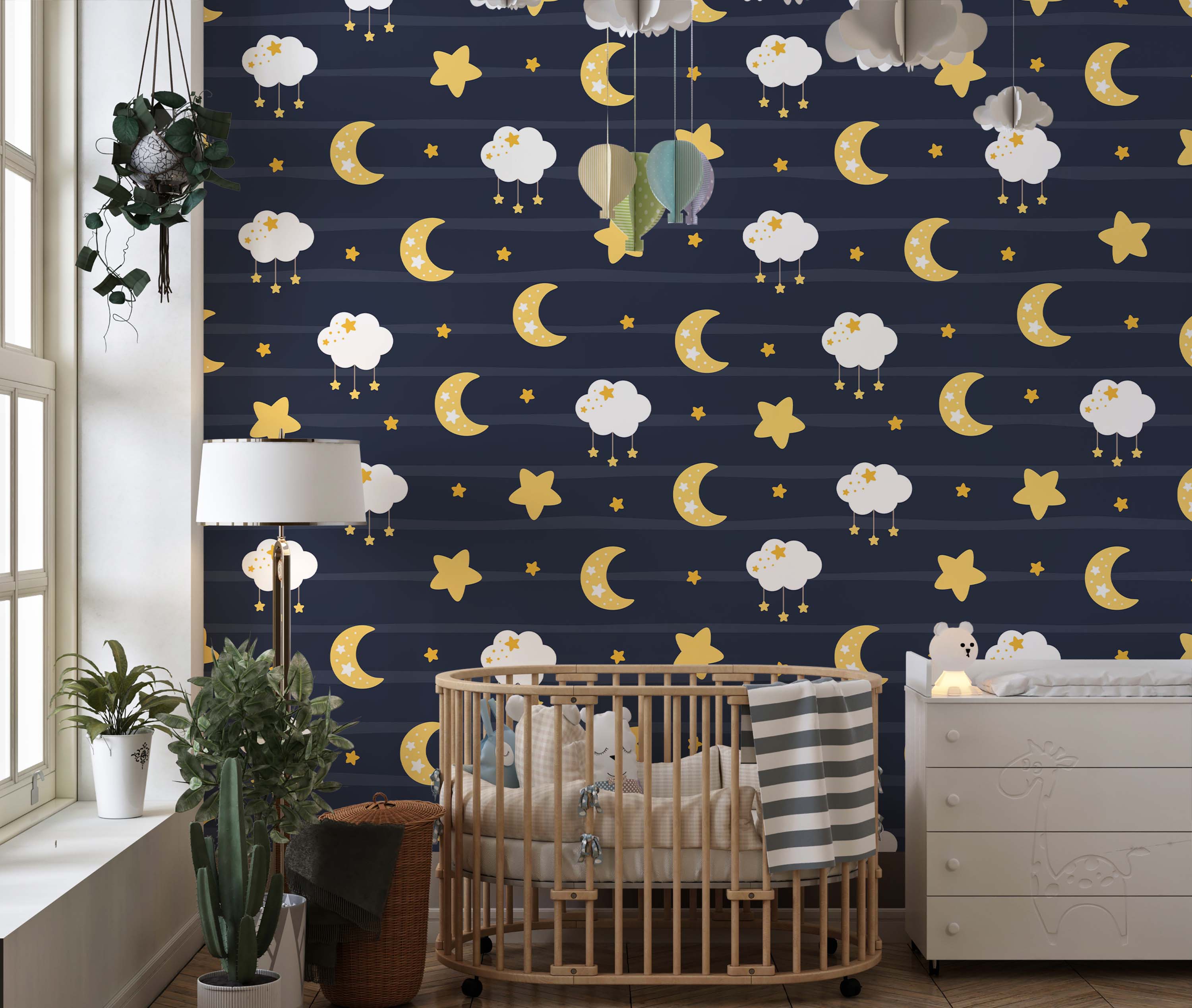 Dark blue striped wallpaper with yellow crescent moons, stars, and white clouds with small hanging stars.