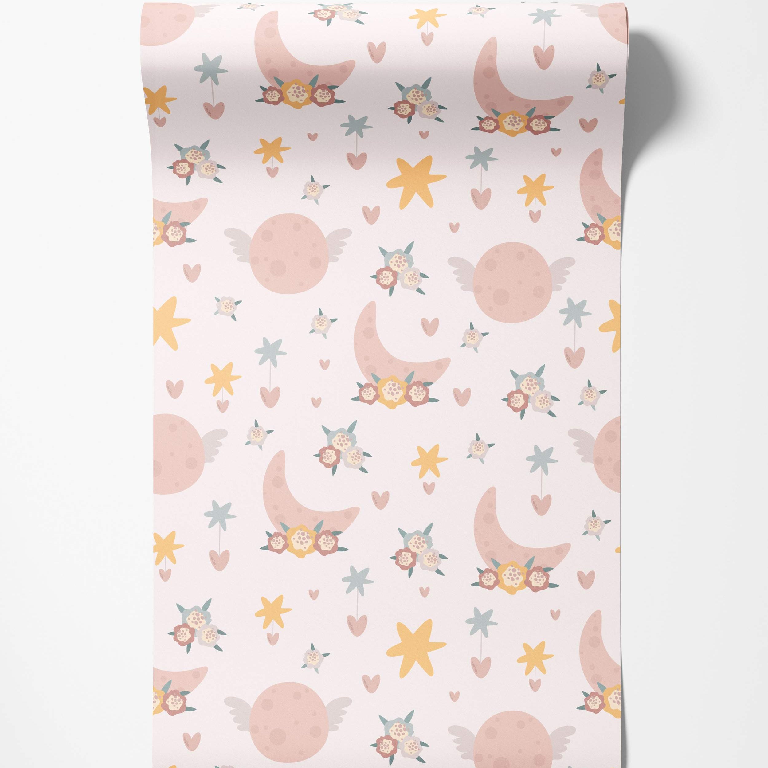 Whimsical wallpaper with pastel pink floral moons, winged planets, stars, and hearts in pink, yellow, and blue on a light background.