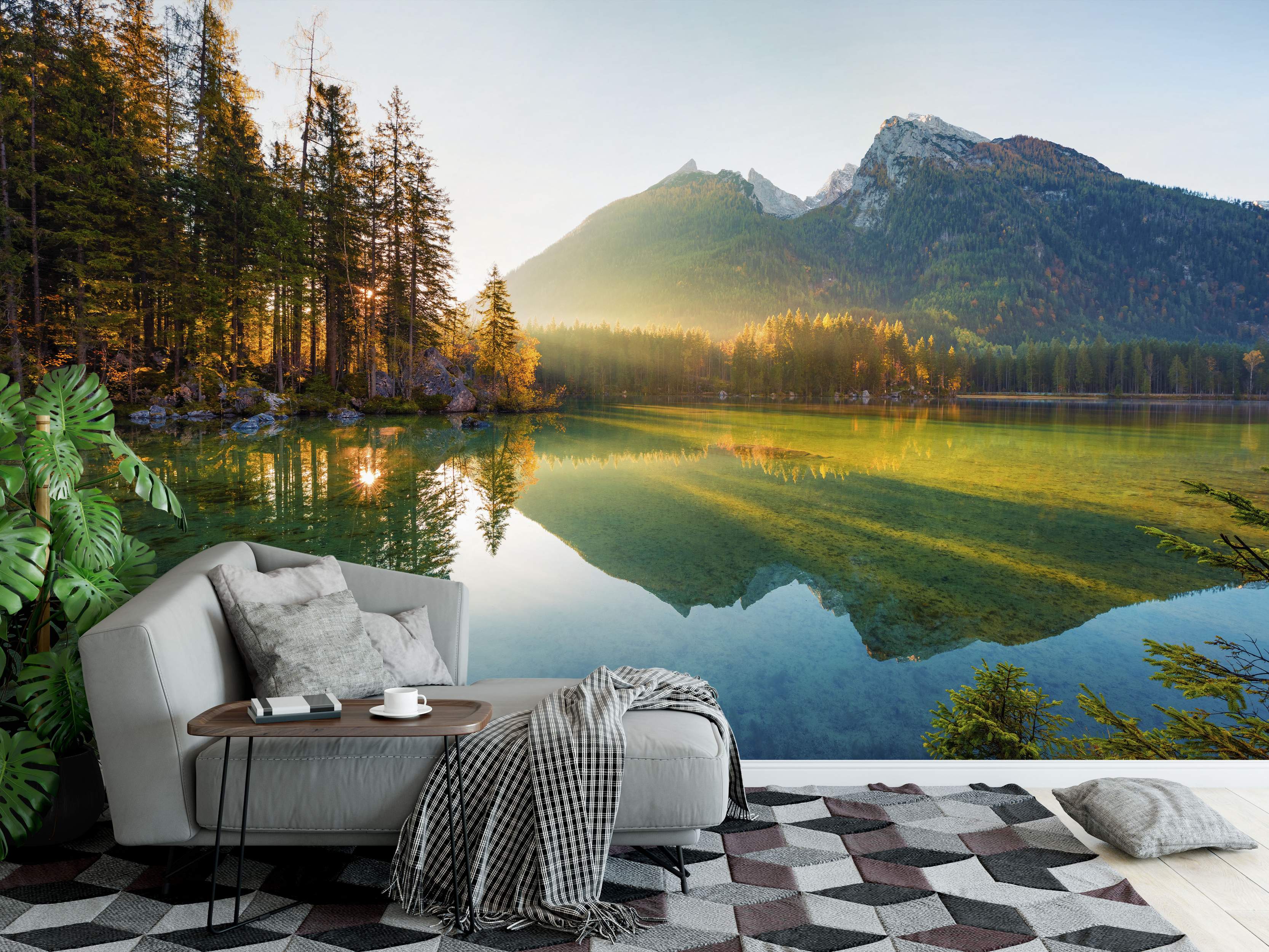 Realistic mural of a sunlit mountain range and autumn forest reflecting perfectly in a tranquil green and blue lake.