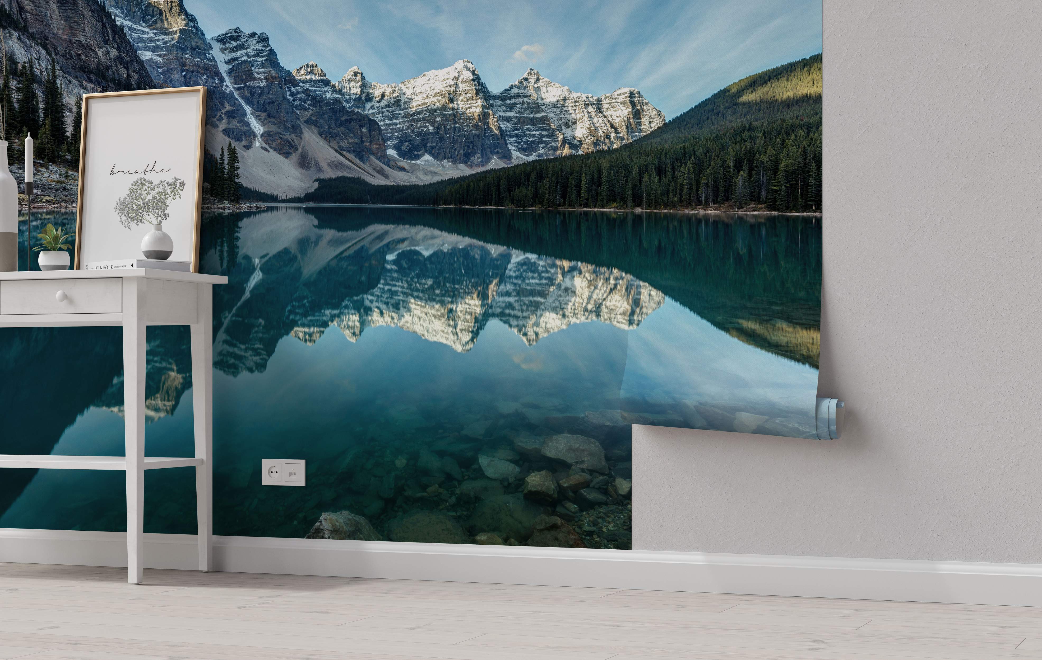 Photographic mural showing snow-capped mountains and forest reflecting perfectly in a clear turquoise lake.