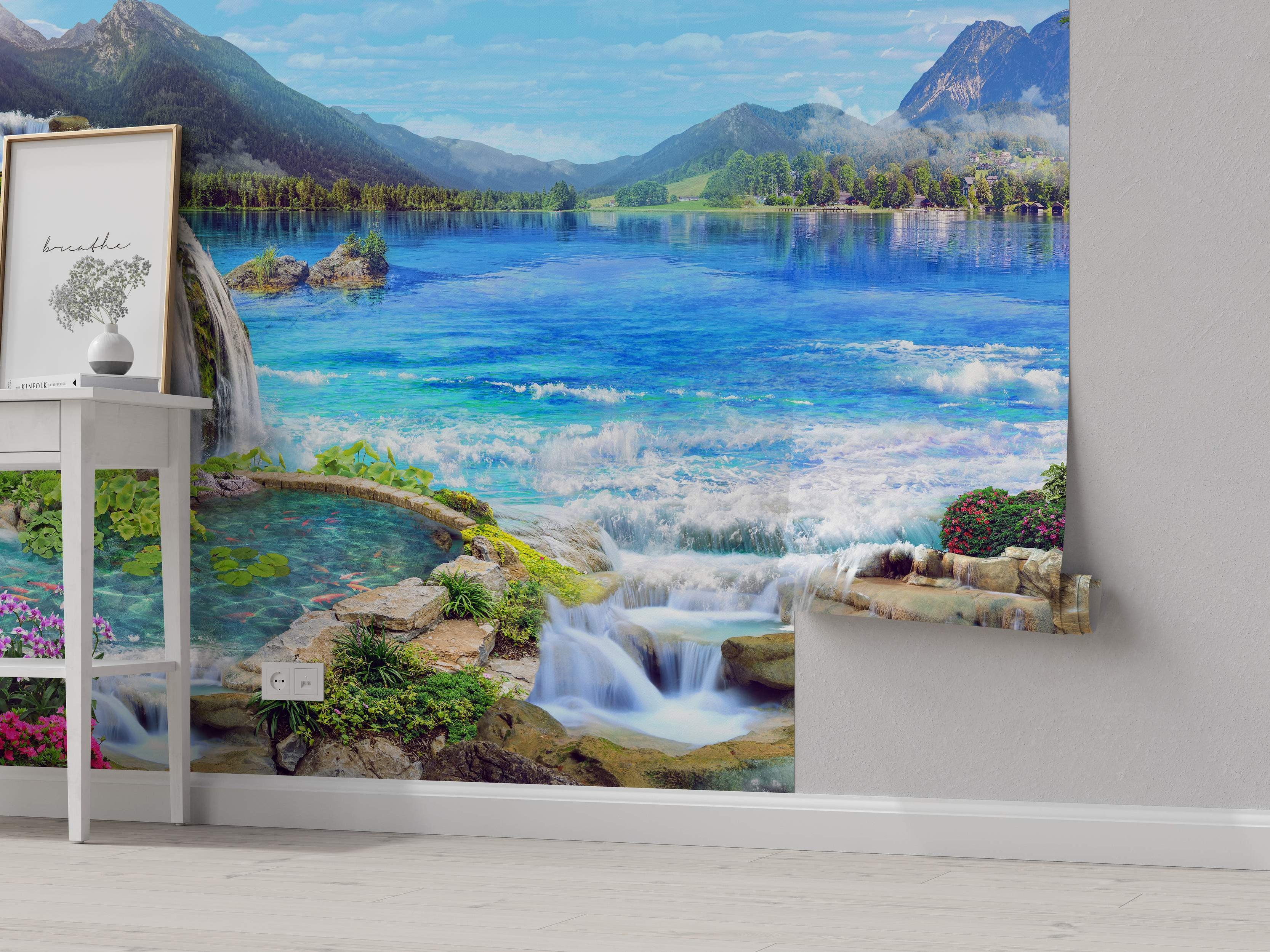 Photorealistic wall mural of a serene mountain landscape featuring a vivid blue lake, green forests, and cascading waterfalls.