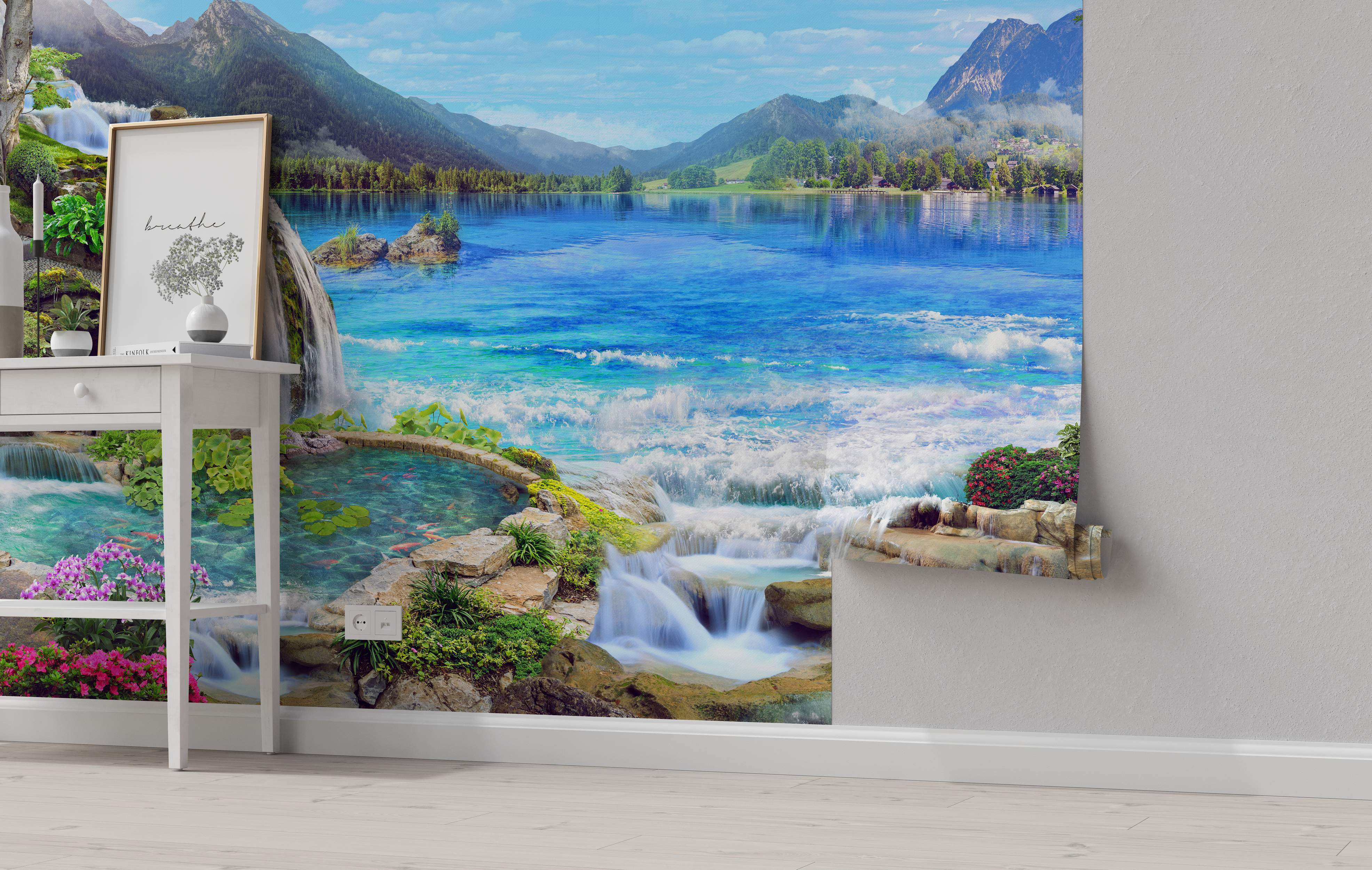Photorealistic wall mural of a serene mountain landscape featuring a vivid blue lake, green forests, and cascading waterfalls.
