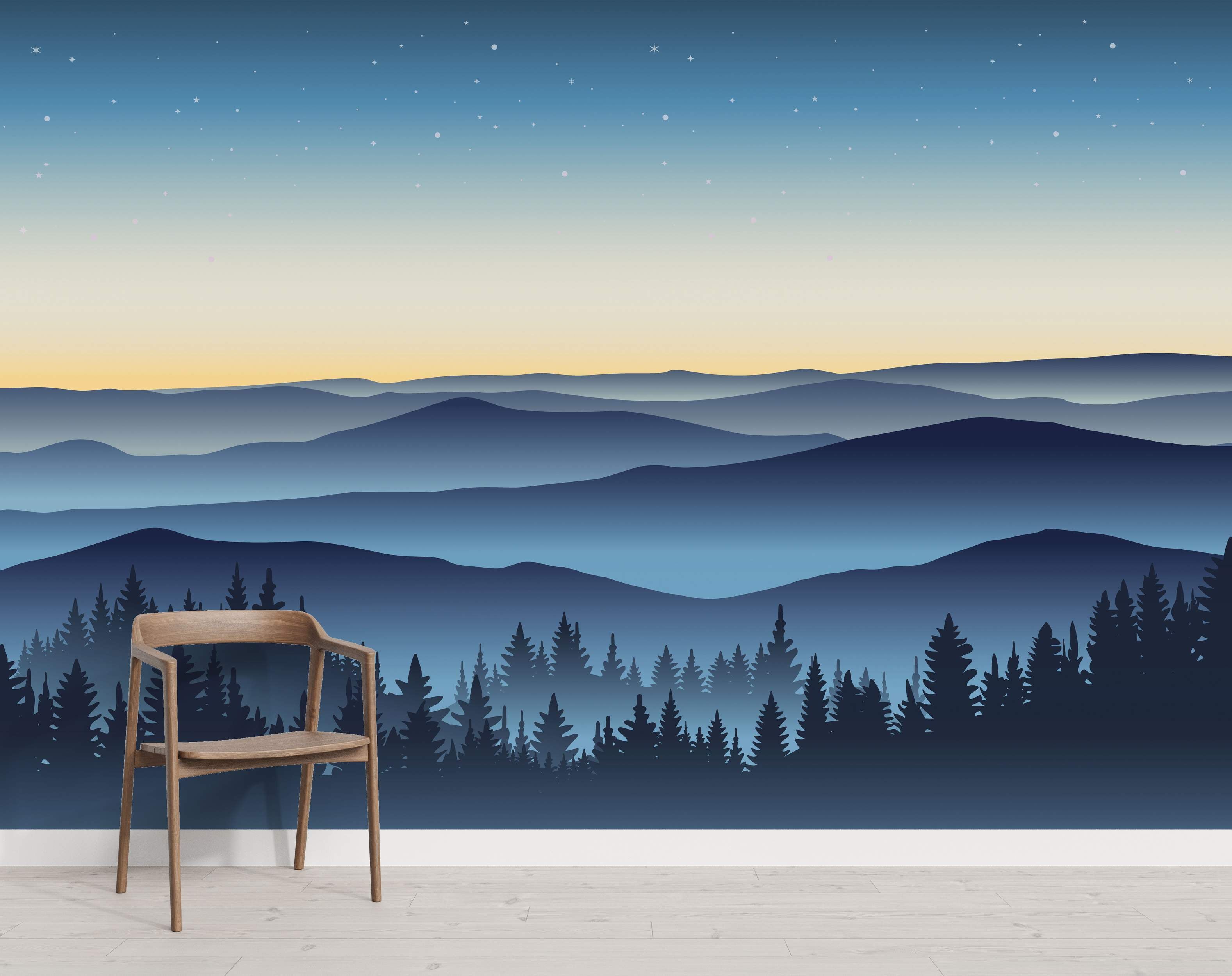 Mural depicting layered blue mountain ranges beneath a starry gradient sky fading from yellow to deep blue, with a dark forest silhouette.