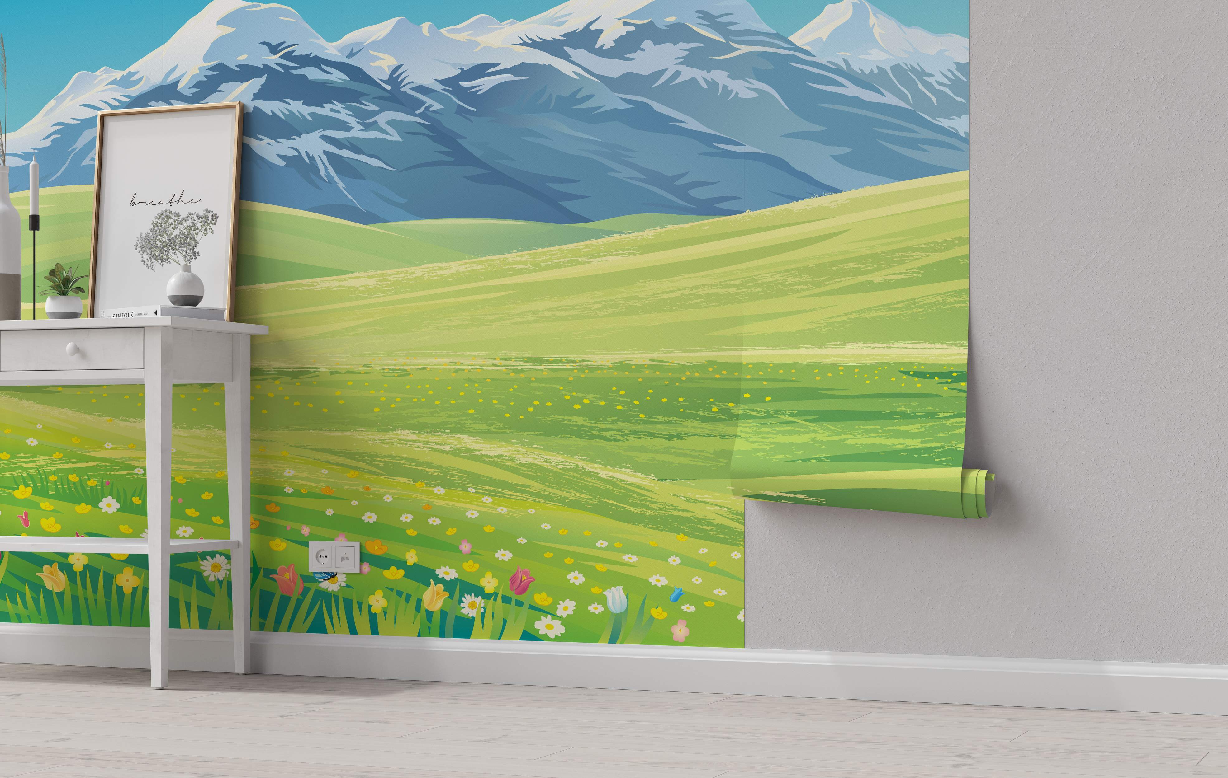 Stylized mountain landscape mural featuring snow-capped blue mountains, rolling green hills, and colorful foreground flowers.