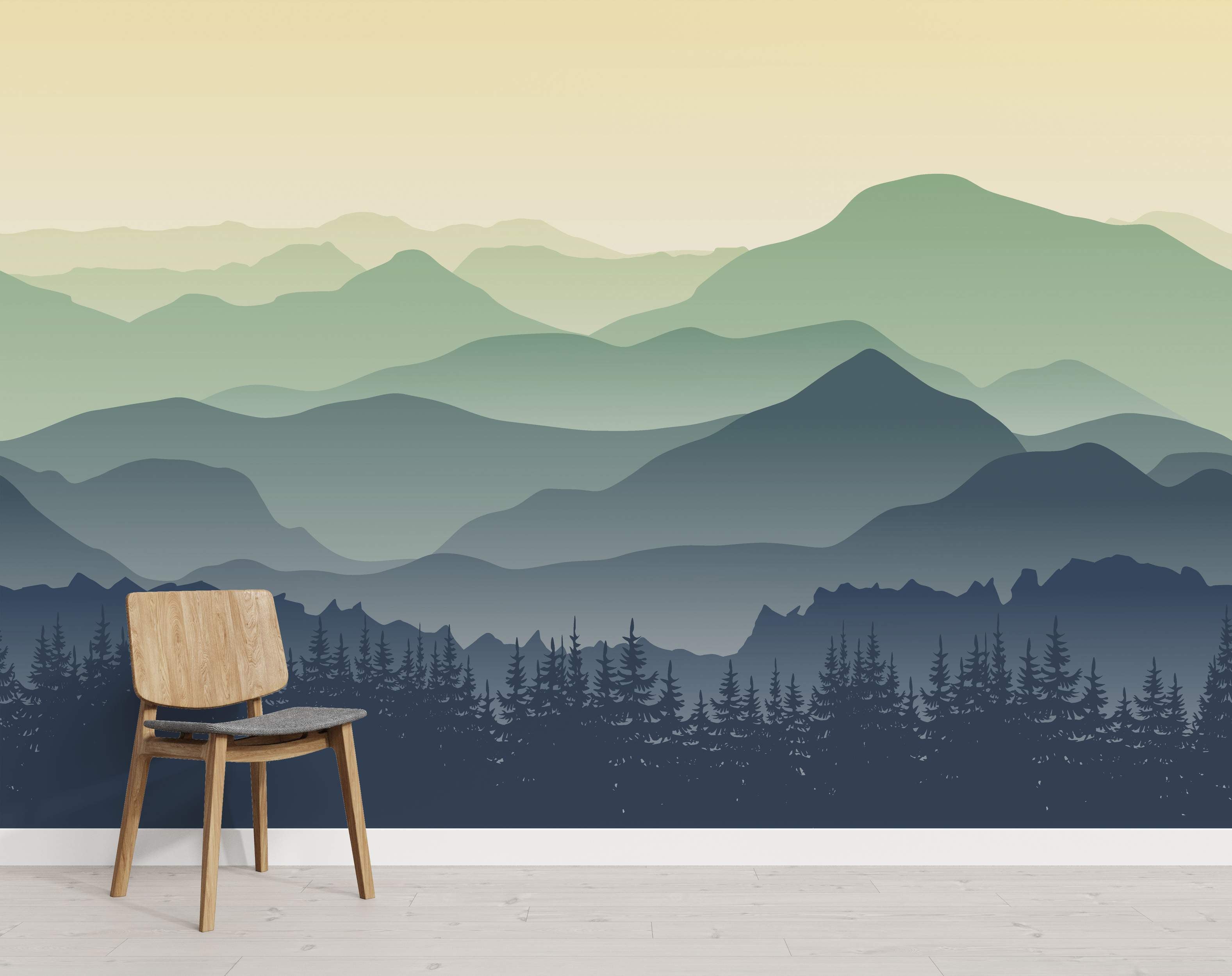 Mountain landscape mural with layered silhouettes in green and blue tones beneath a soft yellow gradient sky and a forest foreground.