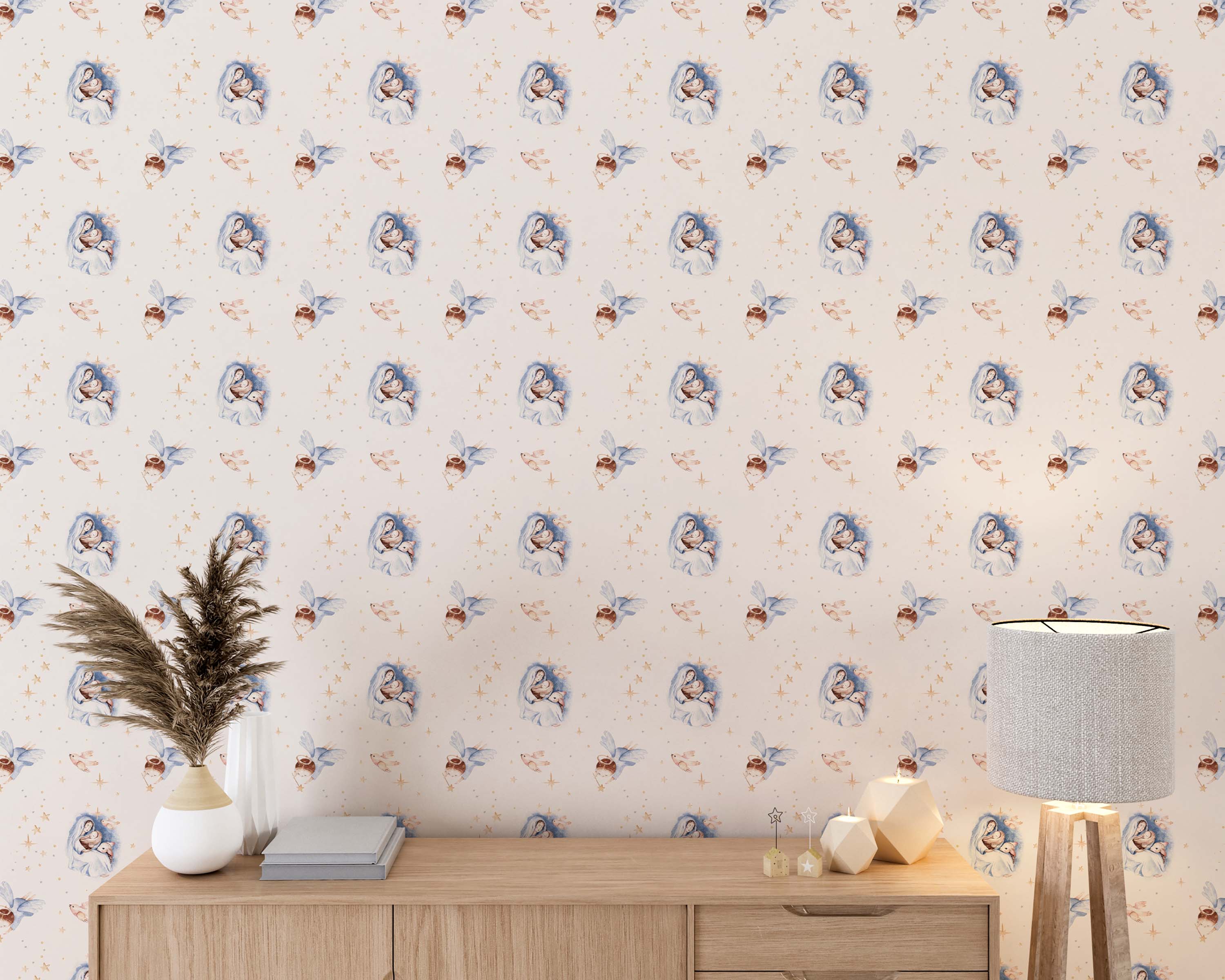 Wallpaper with a repeating watercolor design of Nativity scenes, angels, birds, and stars in soft blue, beige, and gold.