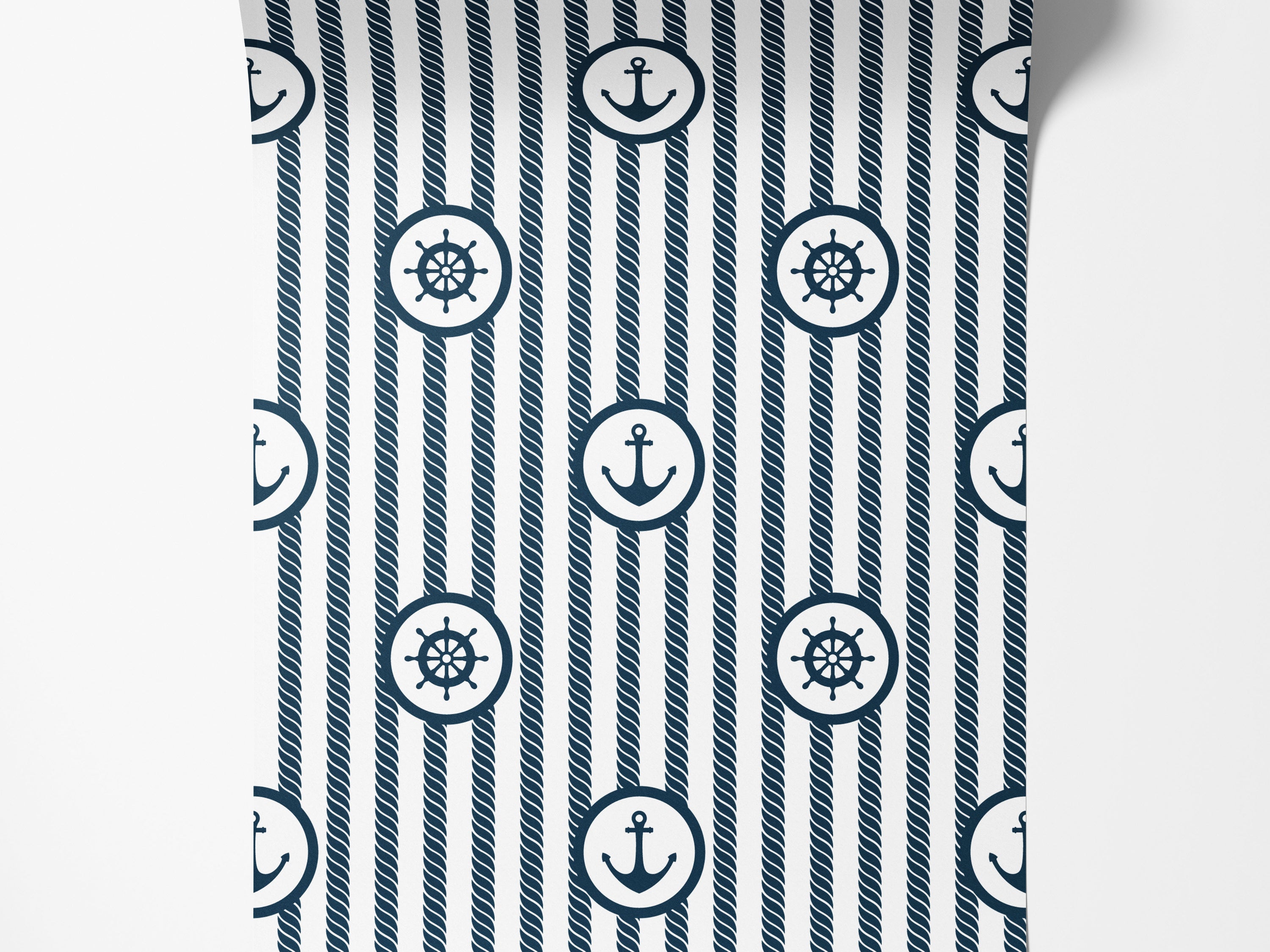 Nautical wallpaper with navy blue rope stripes alternating with circles containing ship's wheels and anchors on a white background.