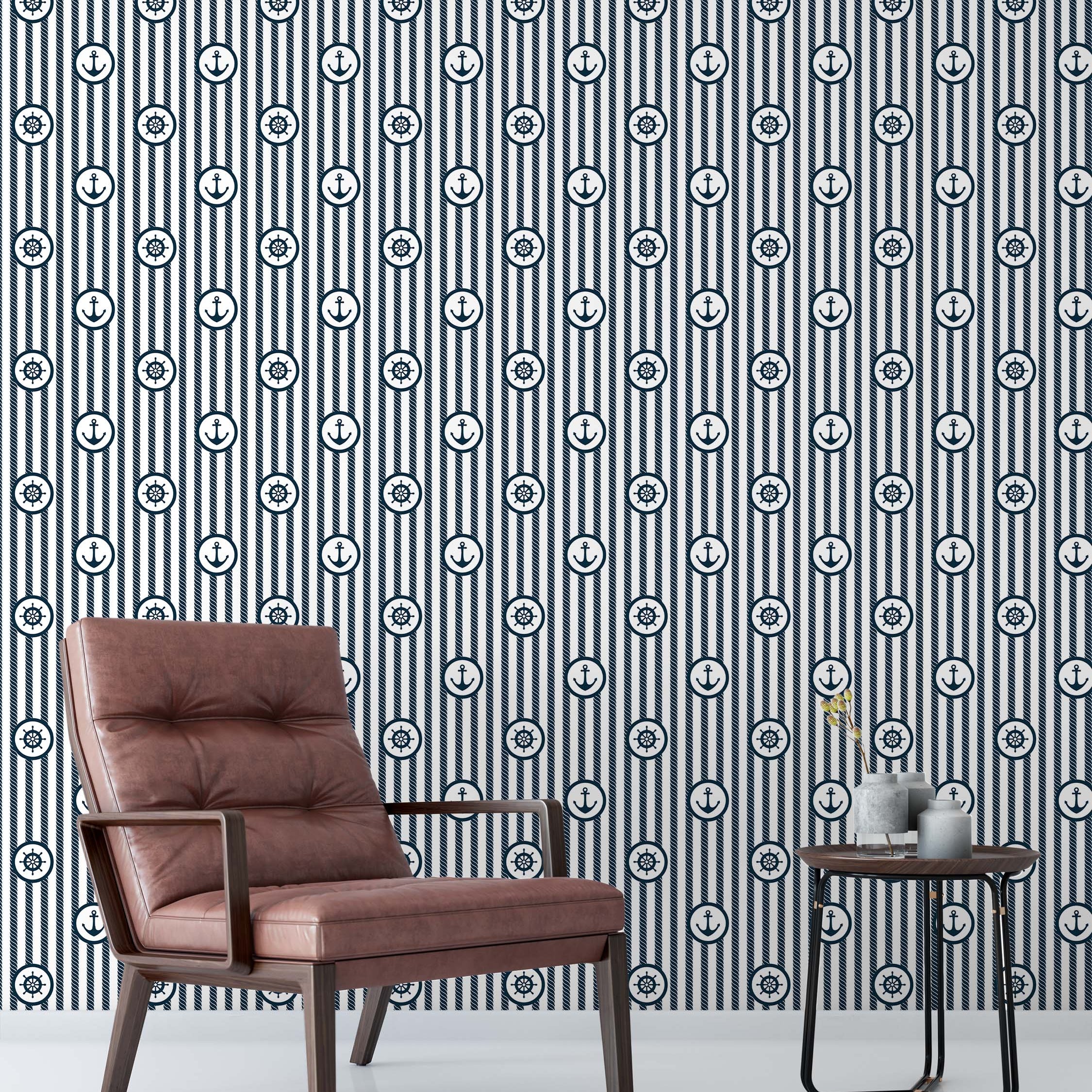 Wallpaper featuring vertical navy blue rope stripes and white stripes, adorned with alternating anchor and helm icons.