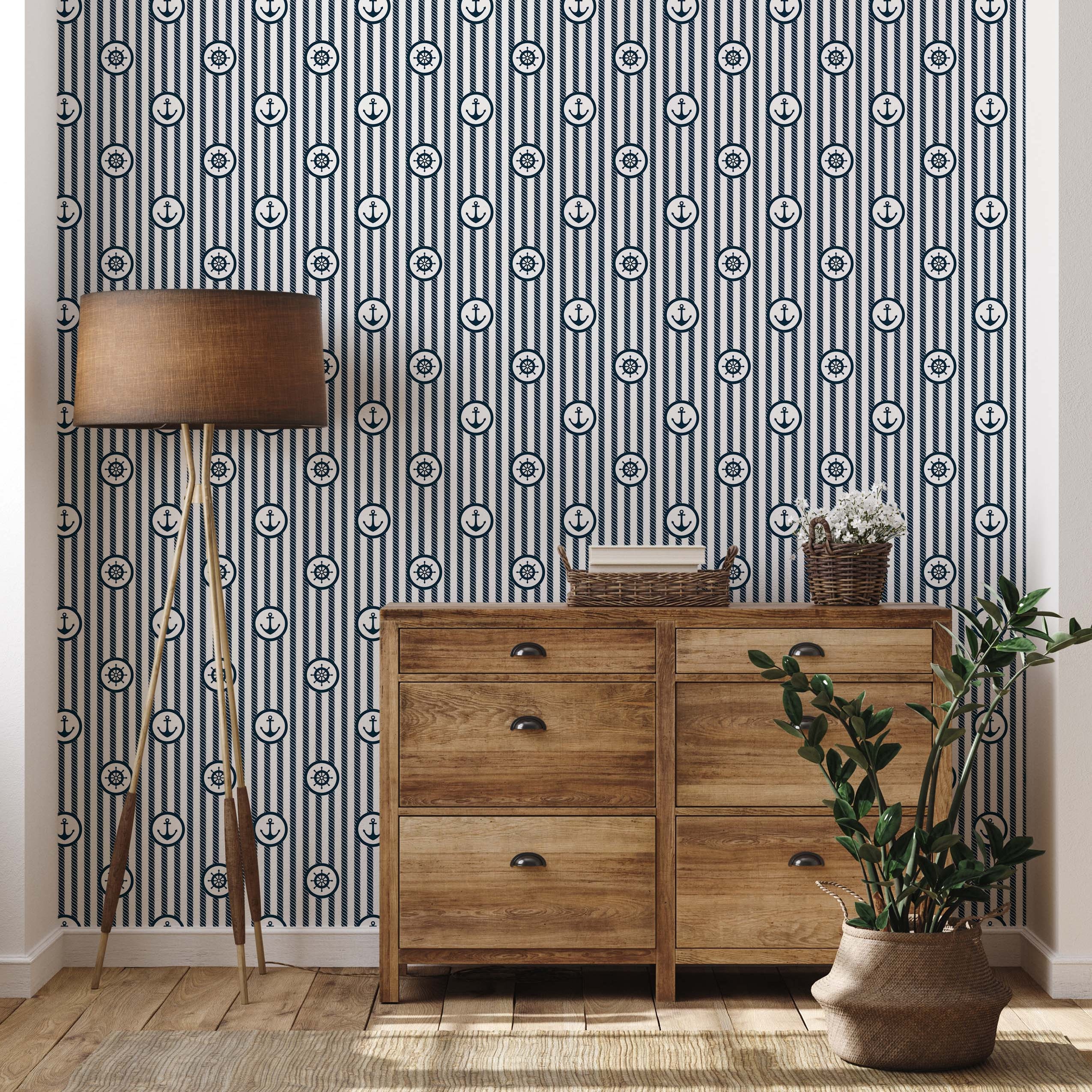 Wallpaper featuring vertical navy blue rope stripes and white stripes, adorned with repeating navy anchor and helm icons.