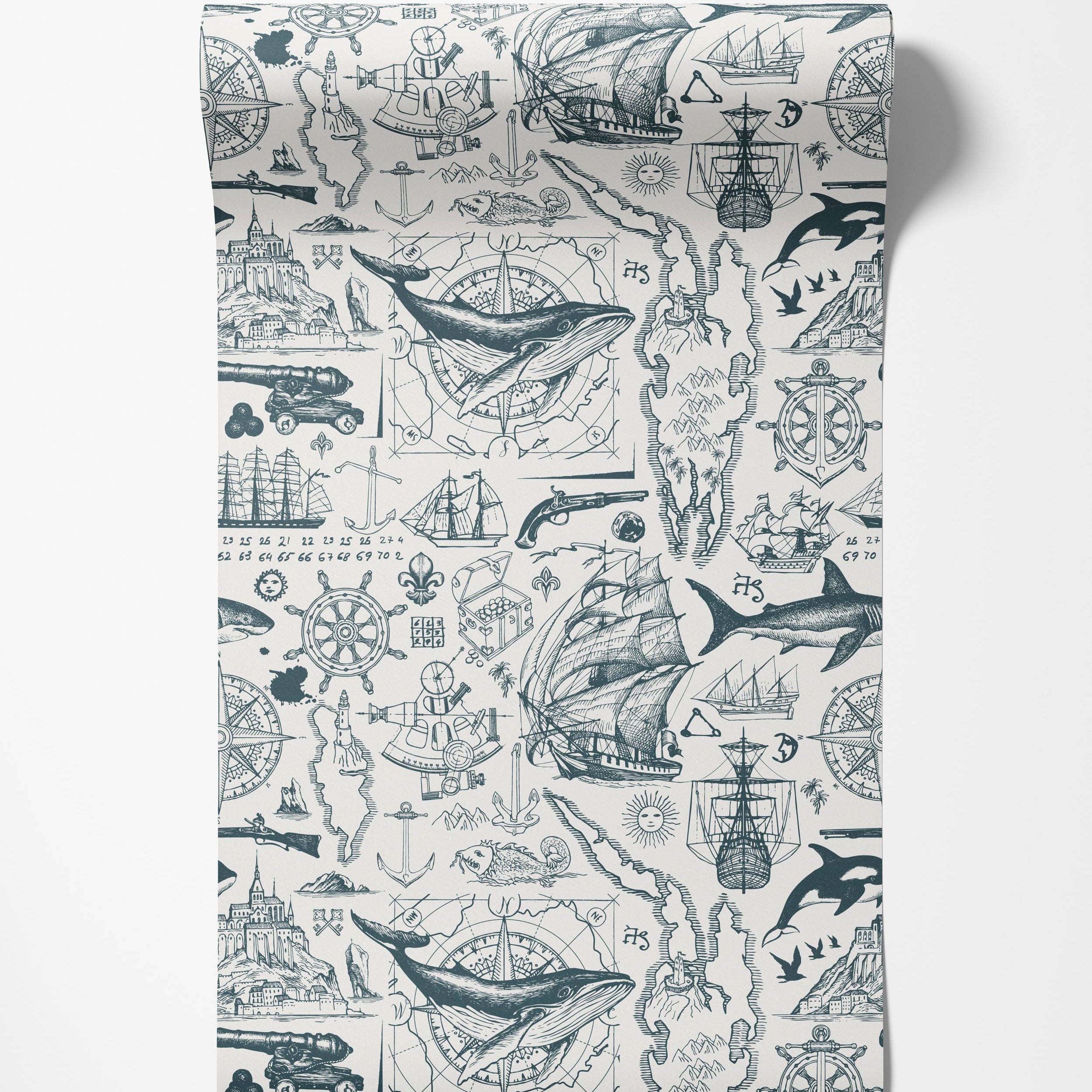 Vintage nautical wallpaper with blue illustrations of ships, whales, and compasses on a white background.